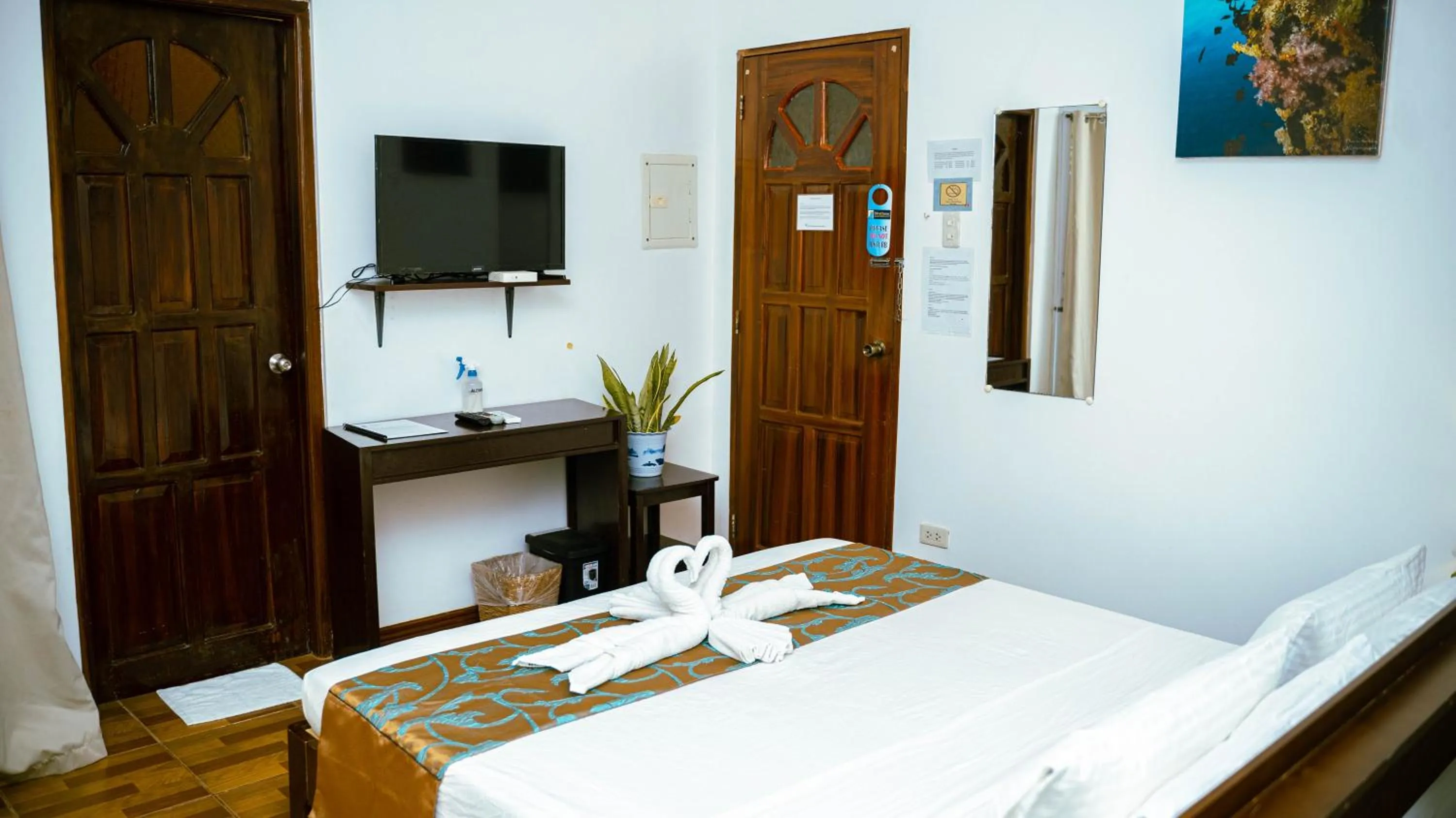 Bed in DiveGurus Boracay Beach Resort