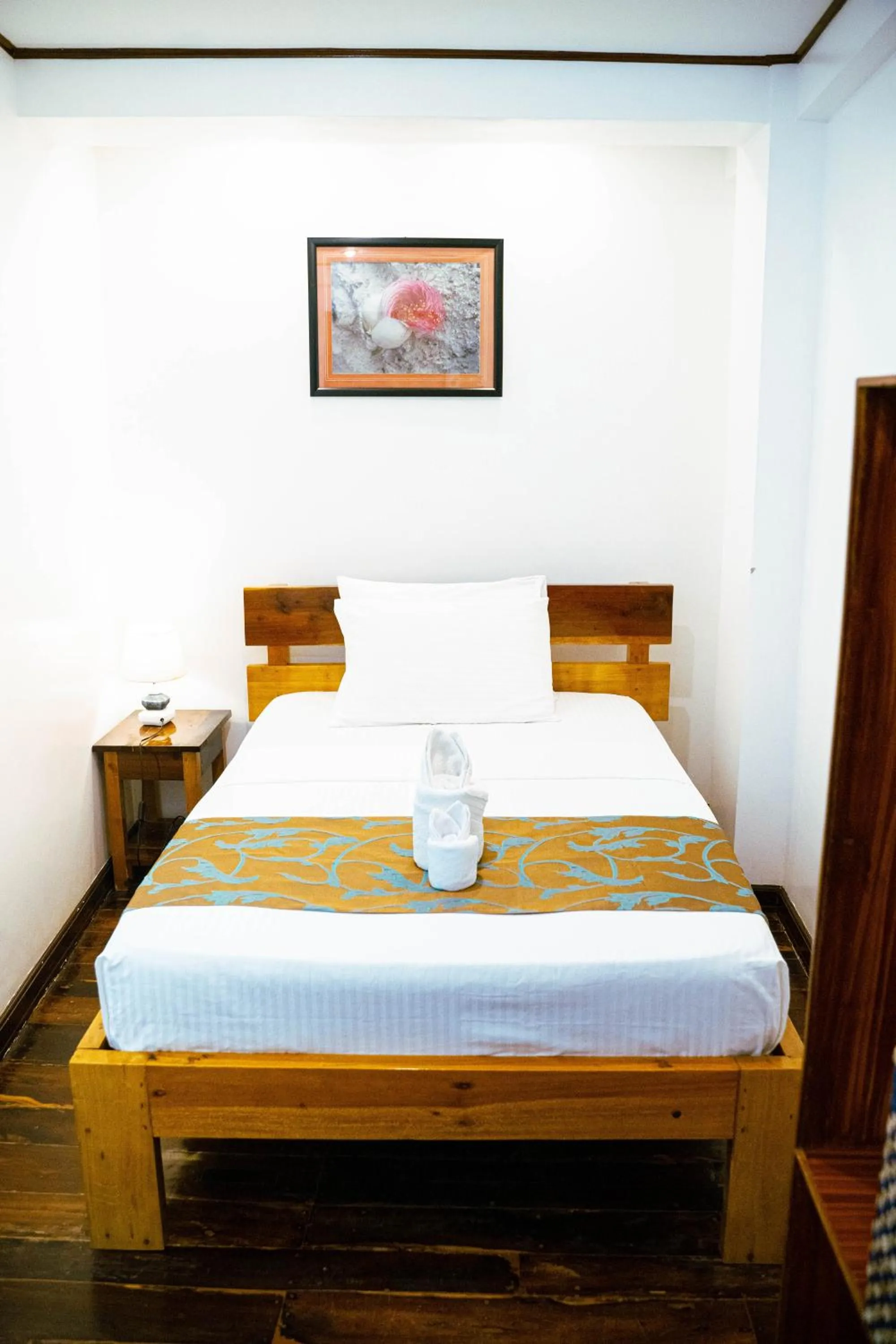 Bed in DiveGurus Boracay Beach Resort