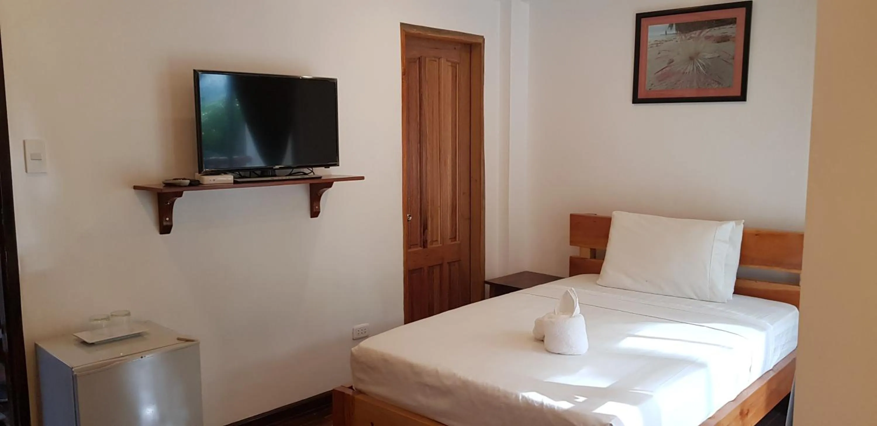 Bed in DiveGurus Boracay Beach Resort