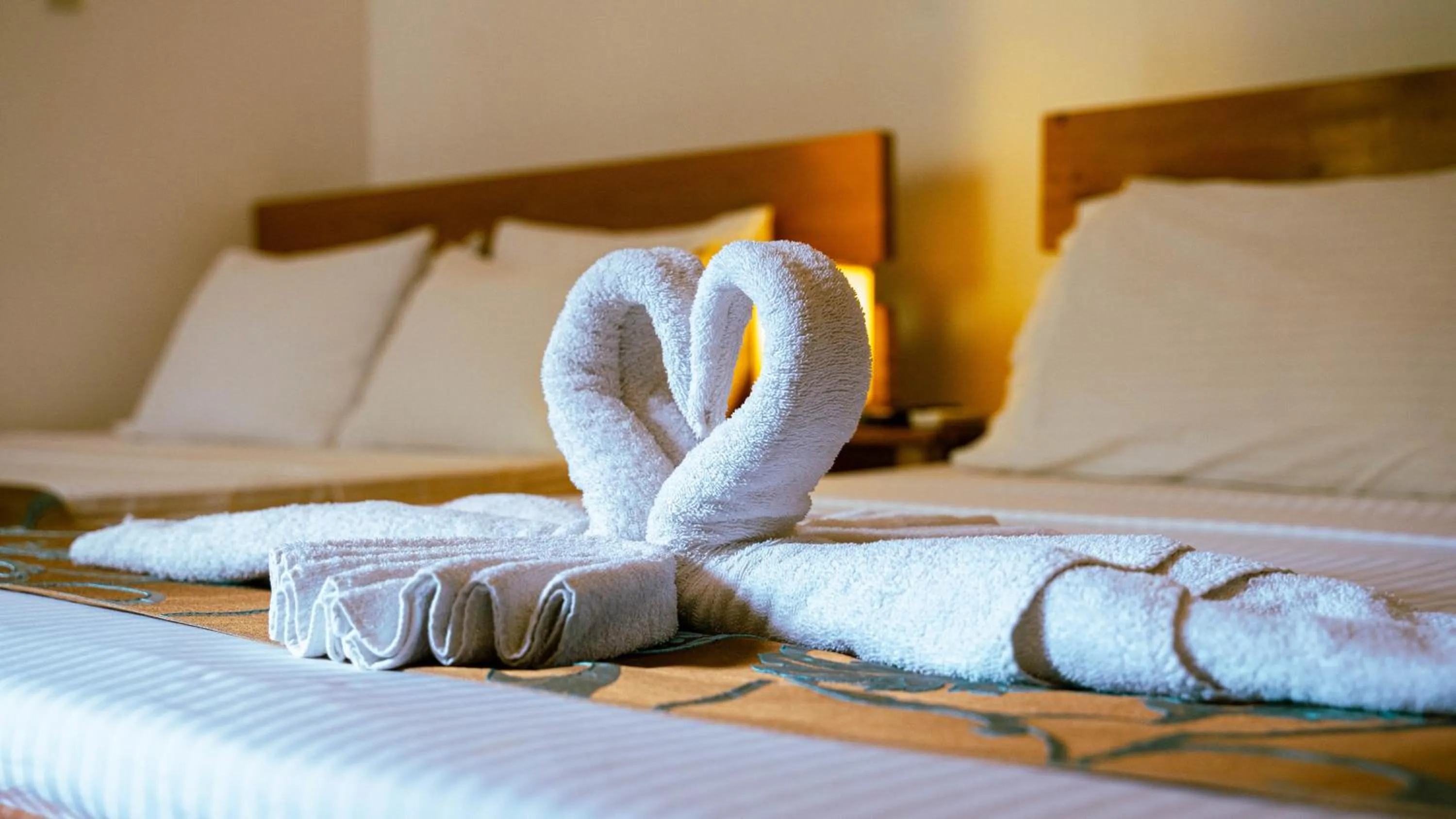 Bed in DiveGurus Boracay Beach Resort