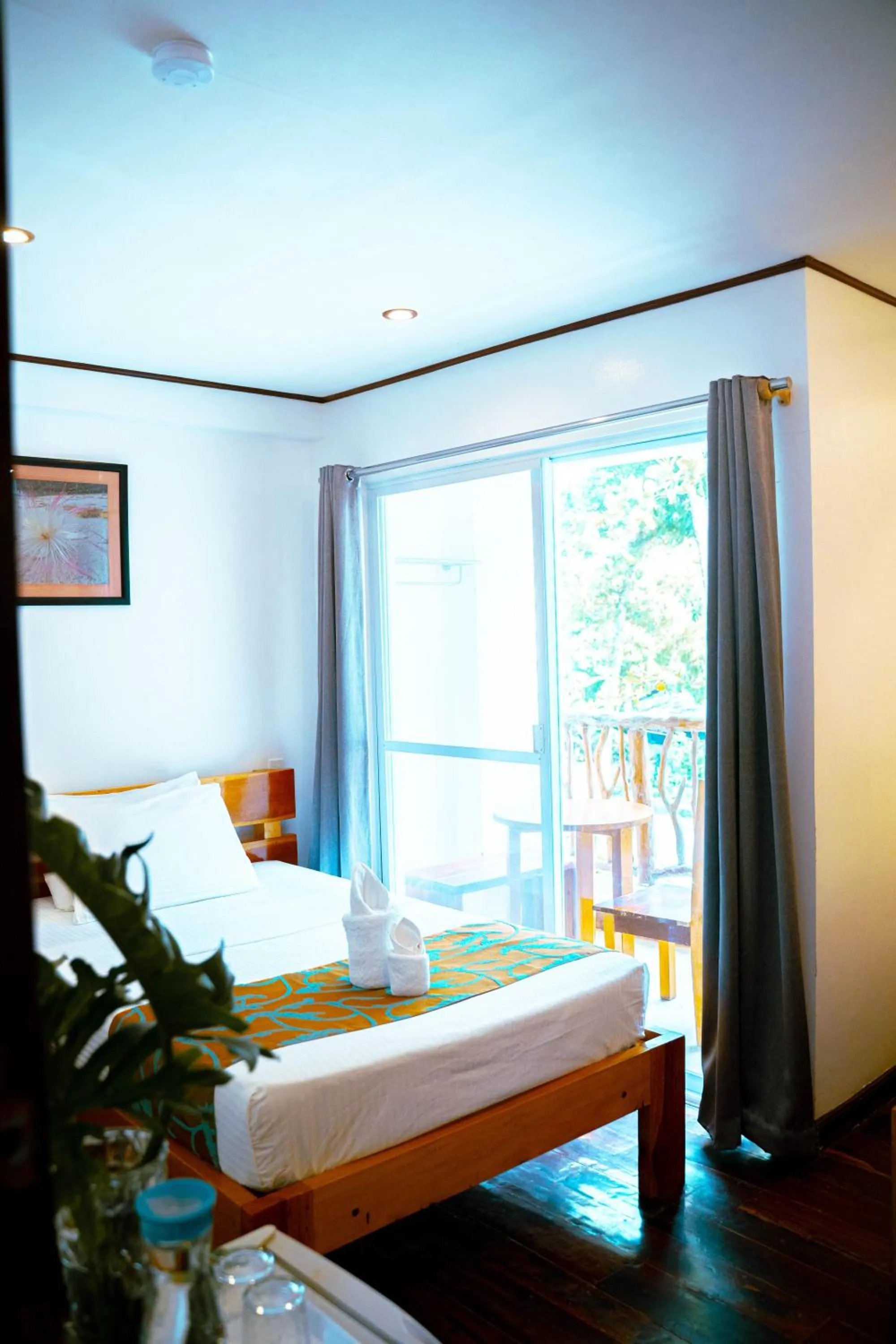 Bed in DiveGurus Boracay Beach Resort