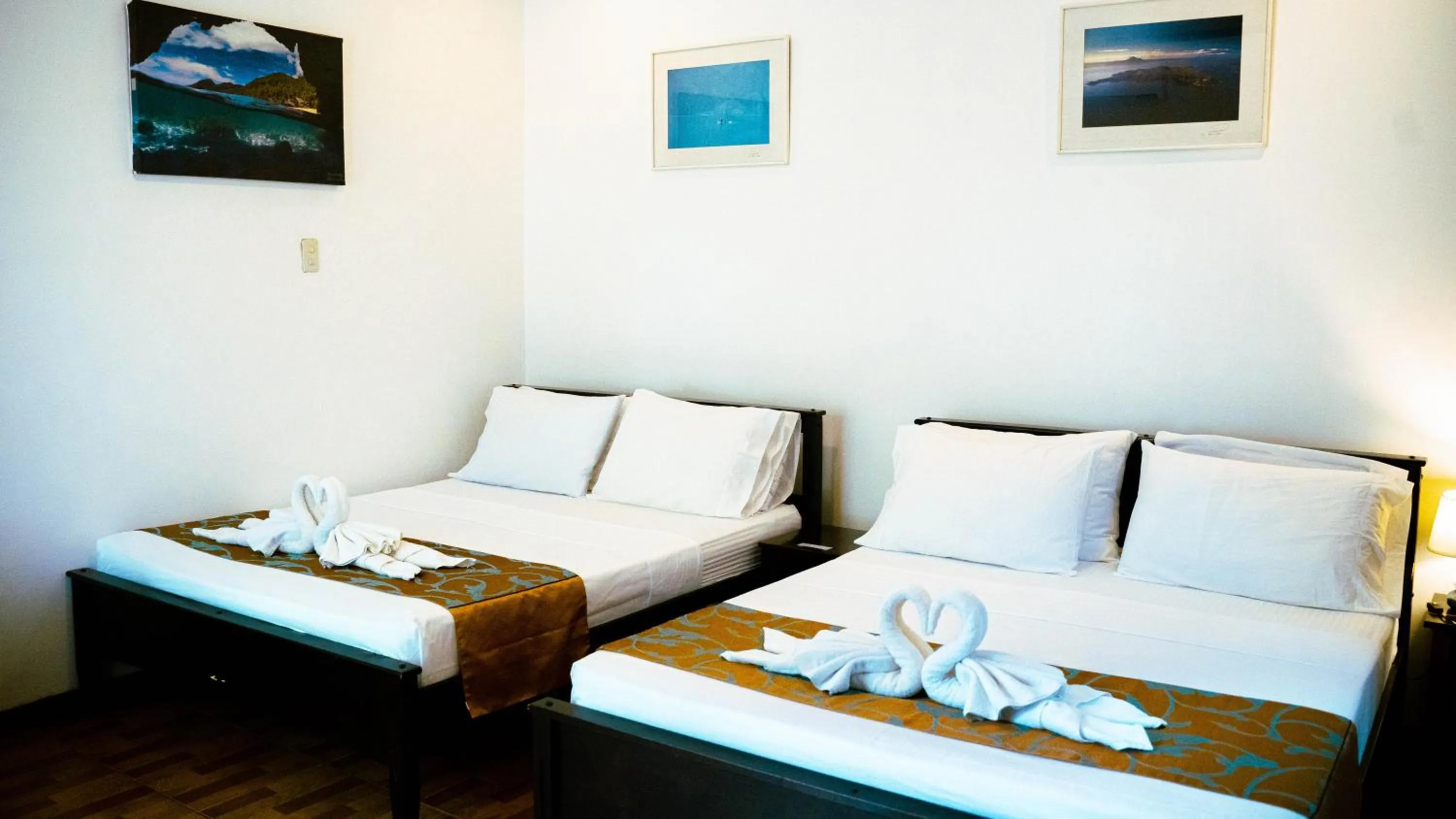 Bed in DiveGurus Boracay Beach Resort