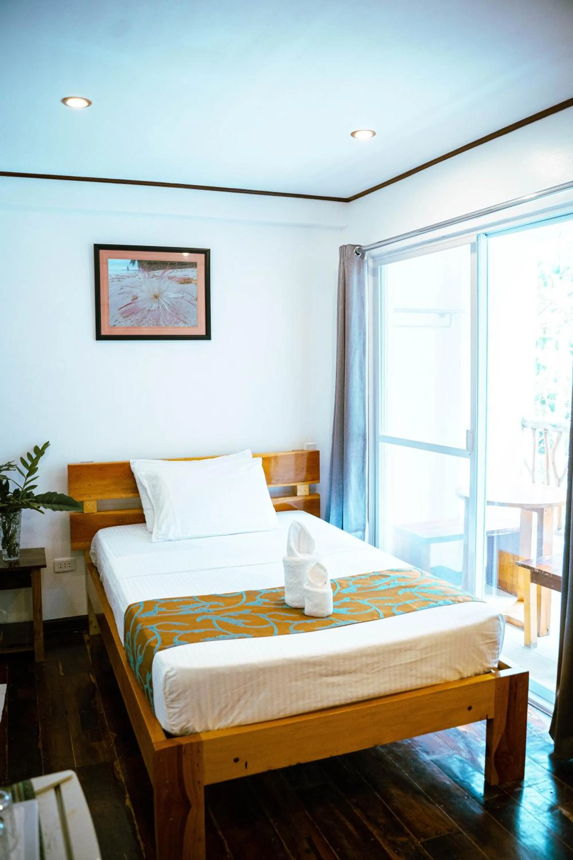 Bed in DiveGurus Boracay Beach Resort