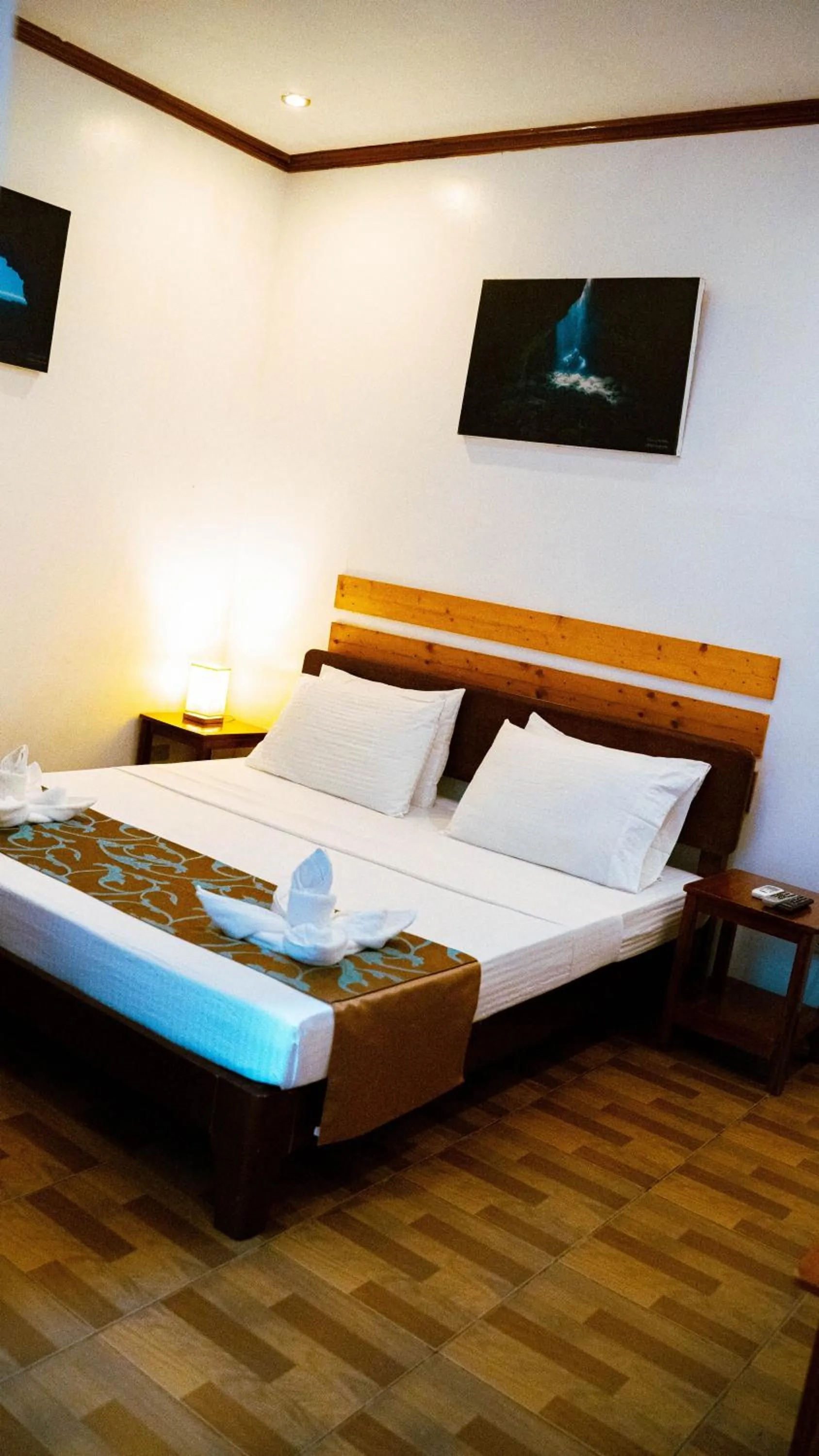 Bed in DiveGurus Boracay Beach Resort