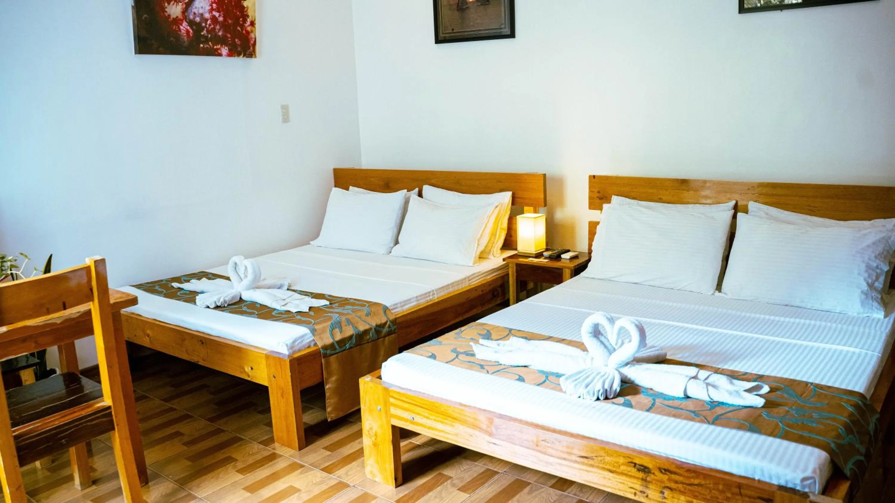 Bed in DiveGurus Boracay Beach Resort