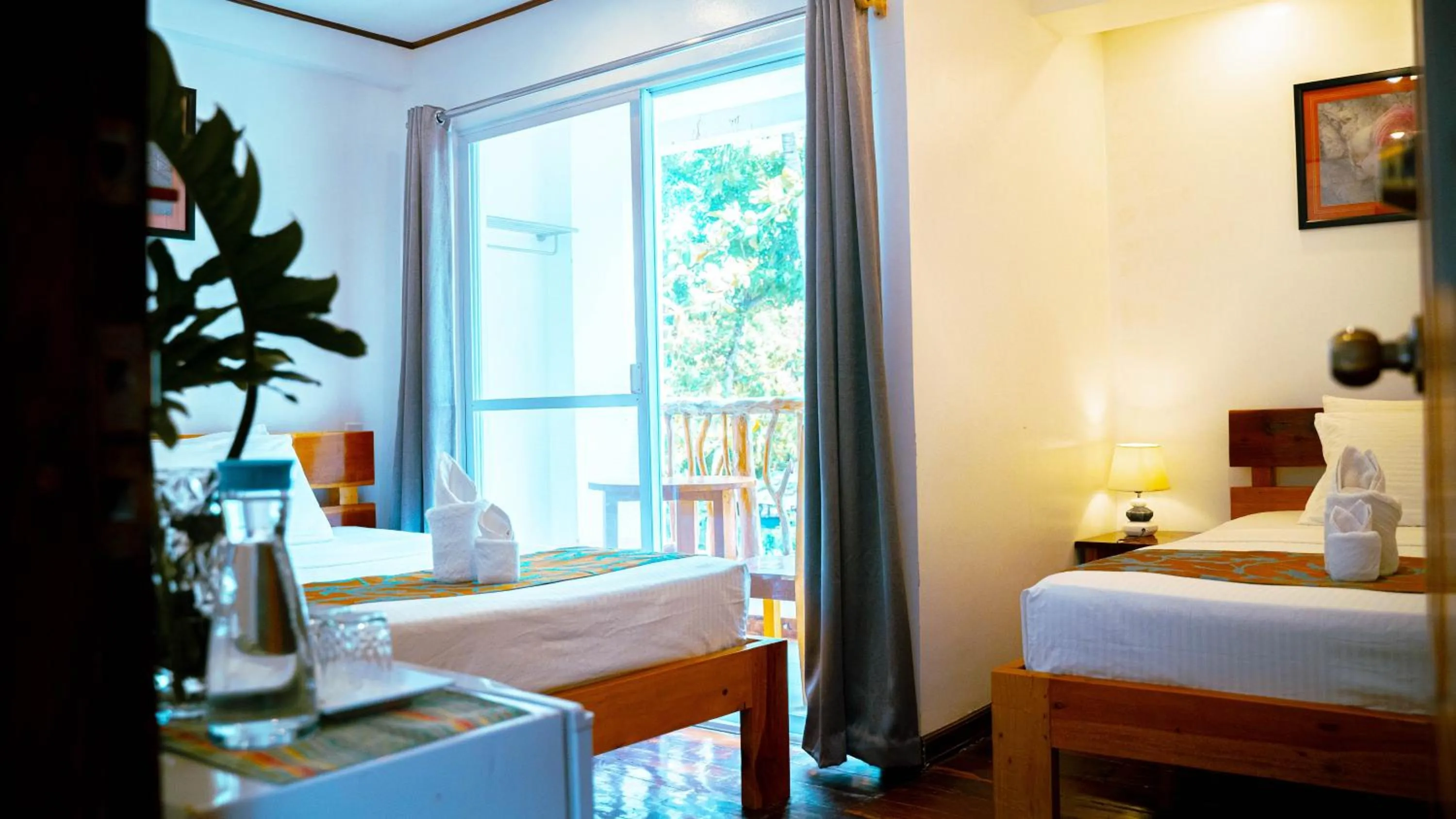 Bed in DiveGurus Boracay Beach Resort