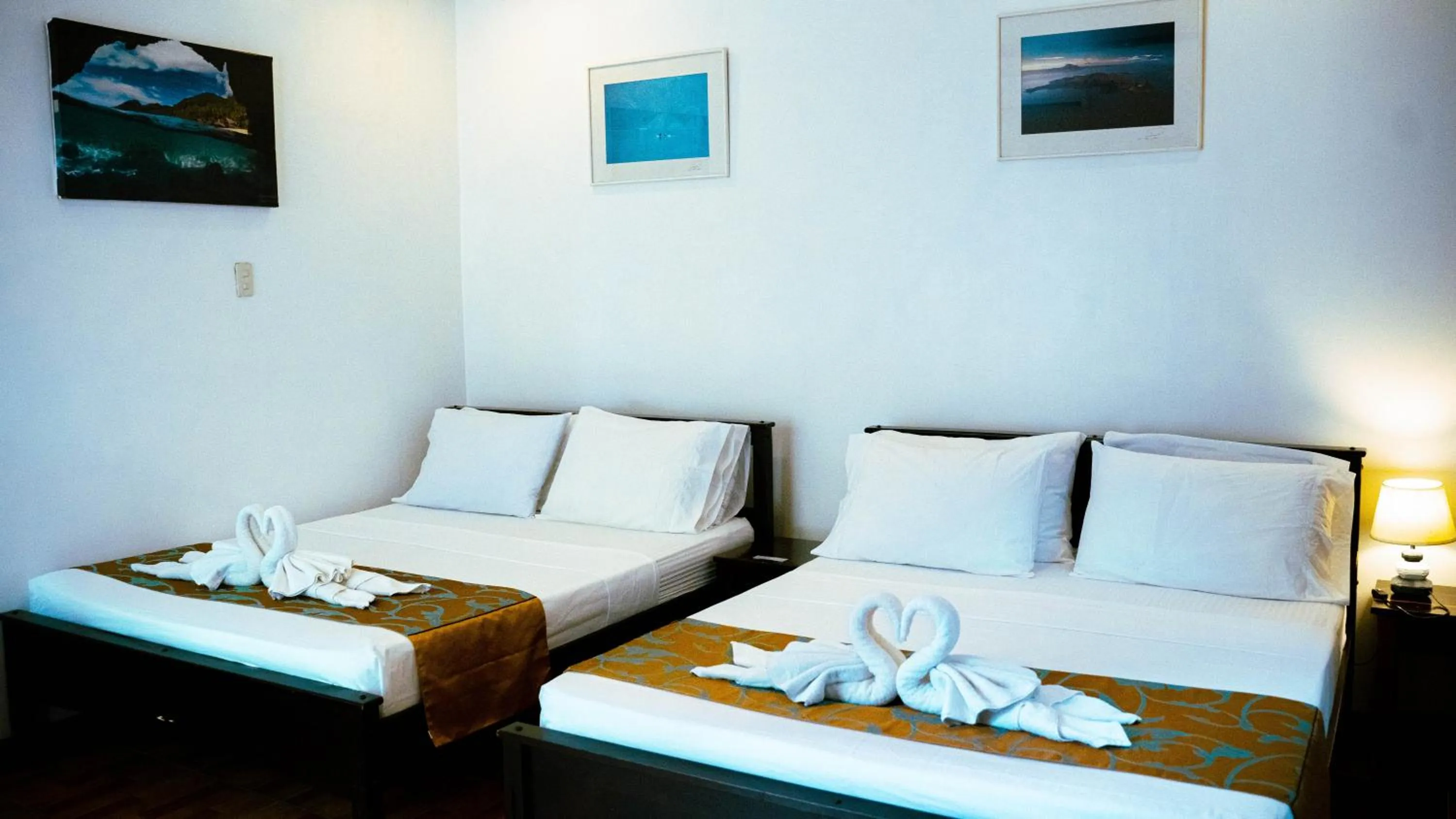 Bed in DiveGurus Boracay Beach Resort