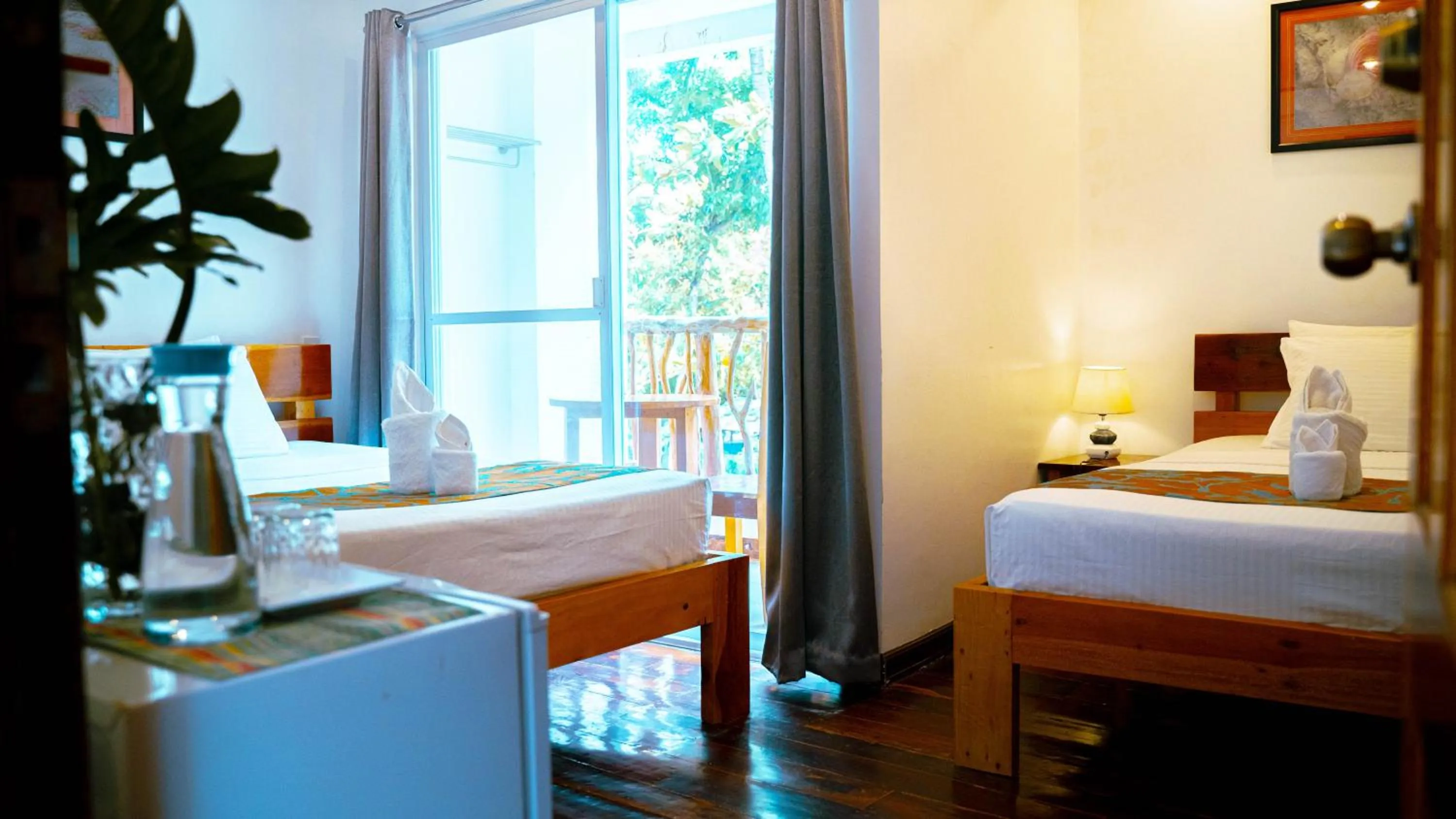 Bed in DiveGurus Boracay Beach Resort