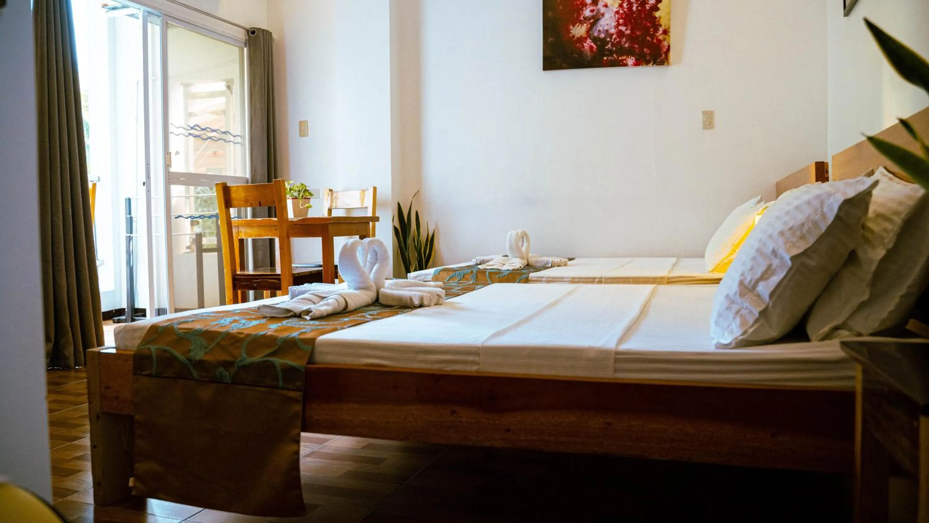 Bed in DiveGurus Boracay Beach Resort