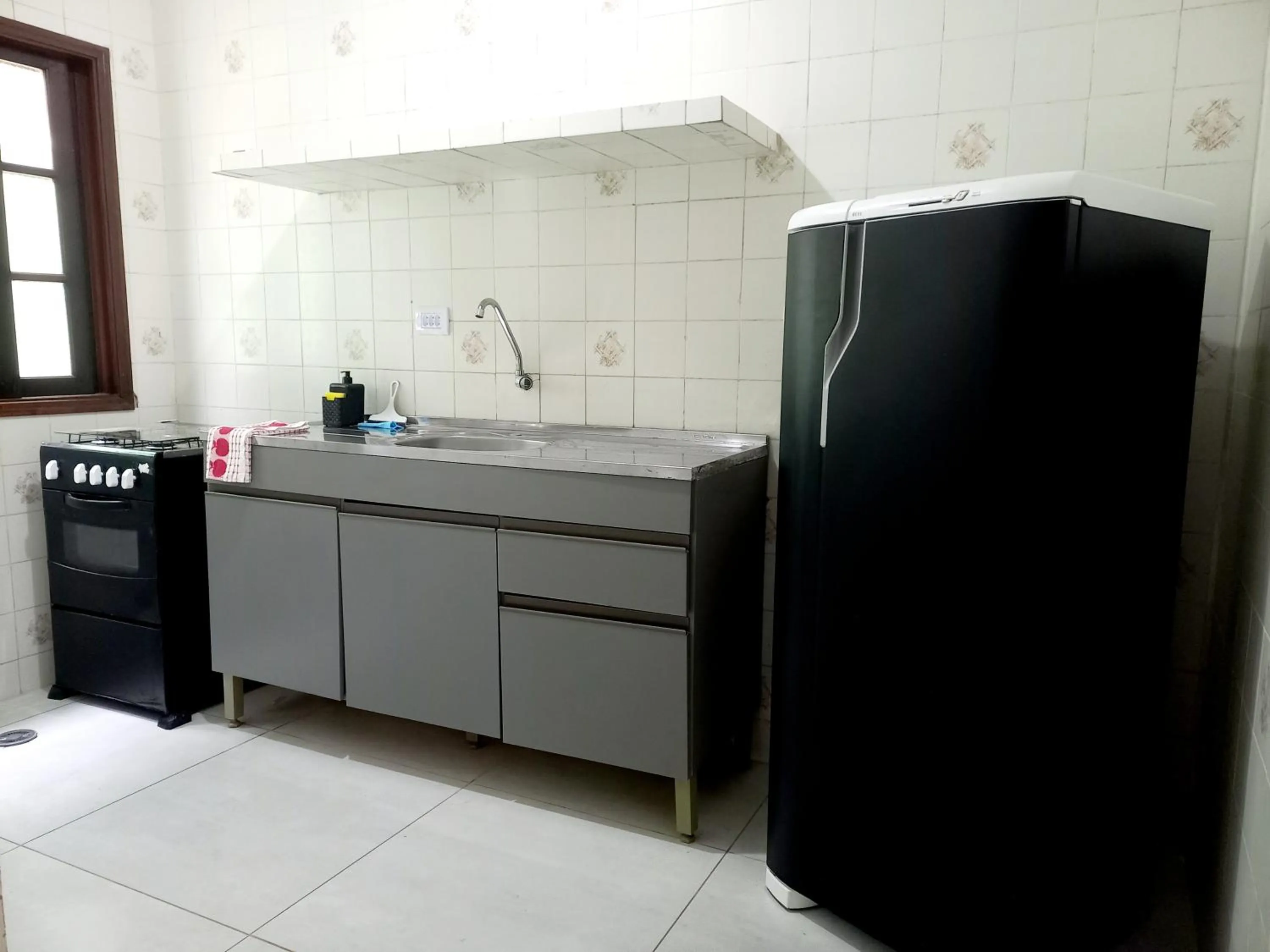 Kitchen or kitchenette in Chalé da Ju