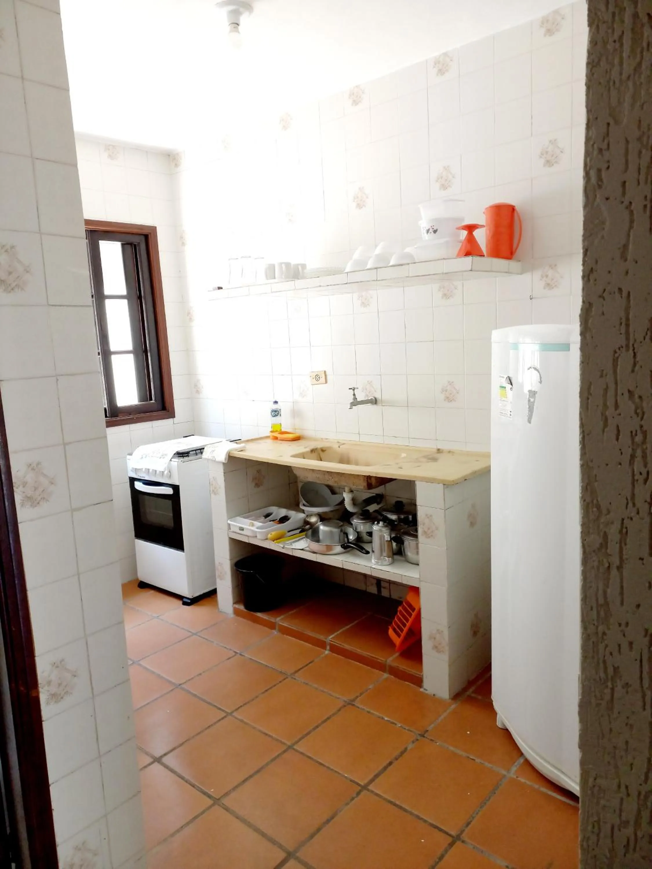 Kitchen or kitchenette in Chalé da Ju