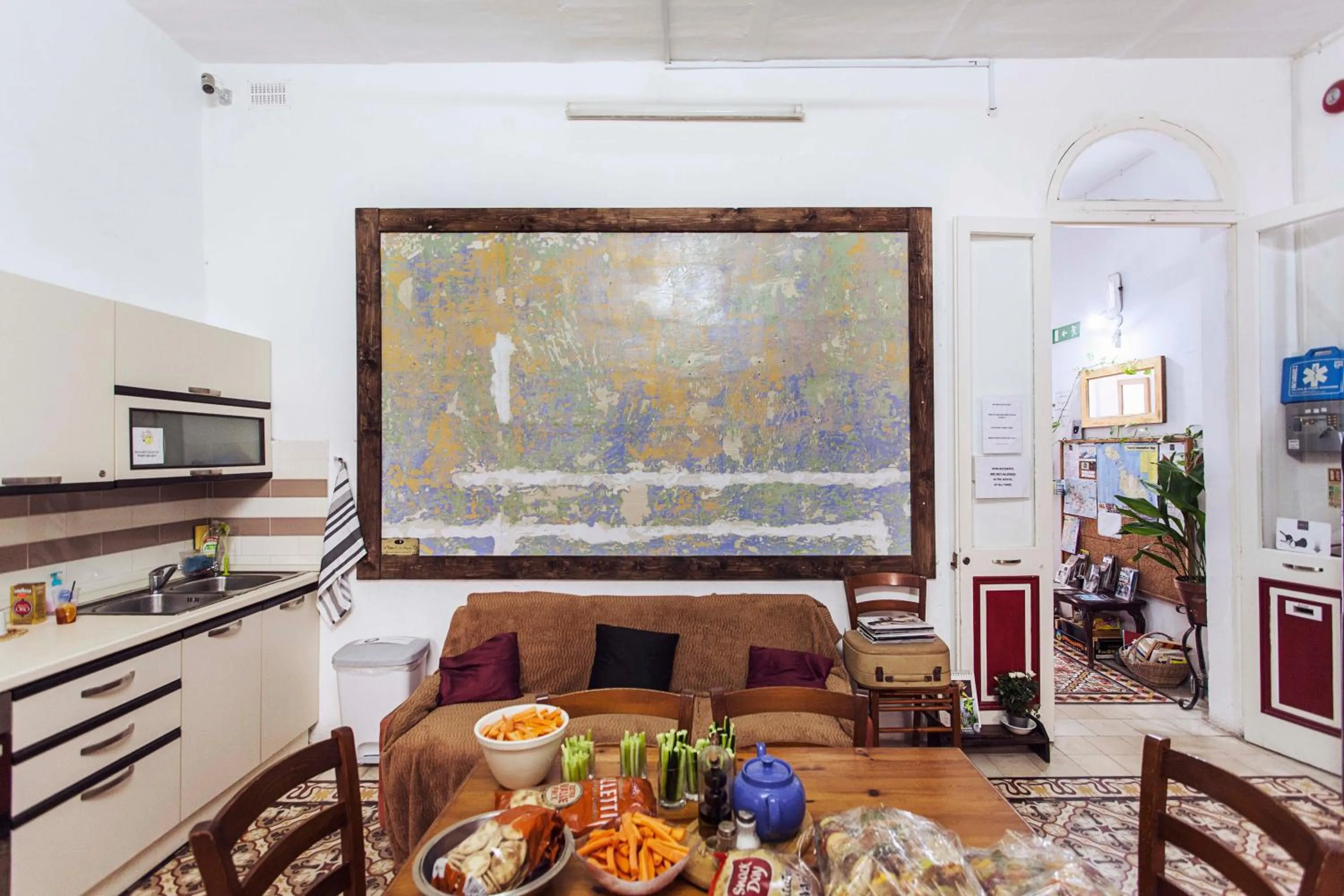 Communal lounge/ TV room in Granny's Inn Hostel