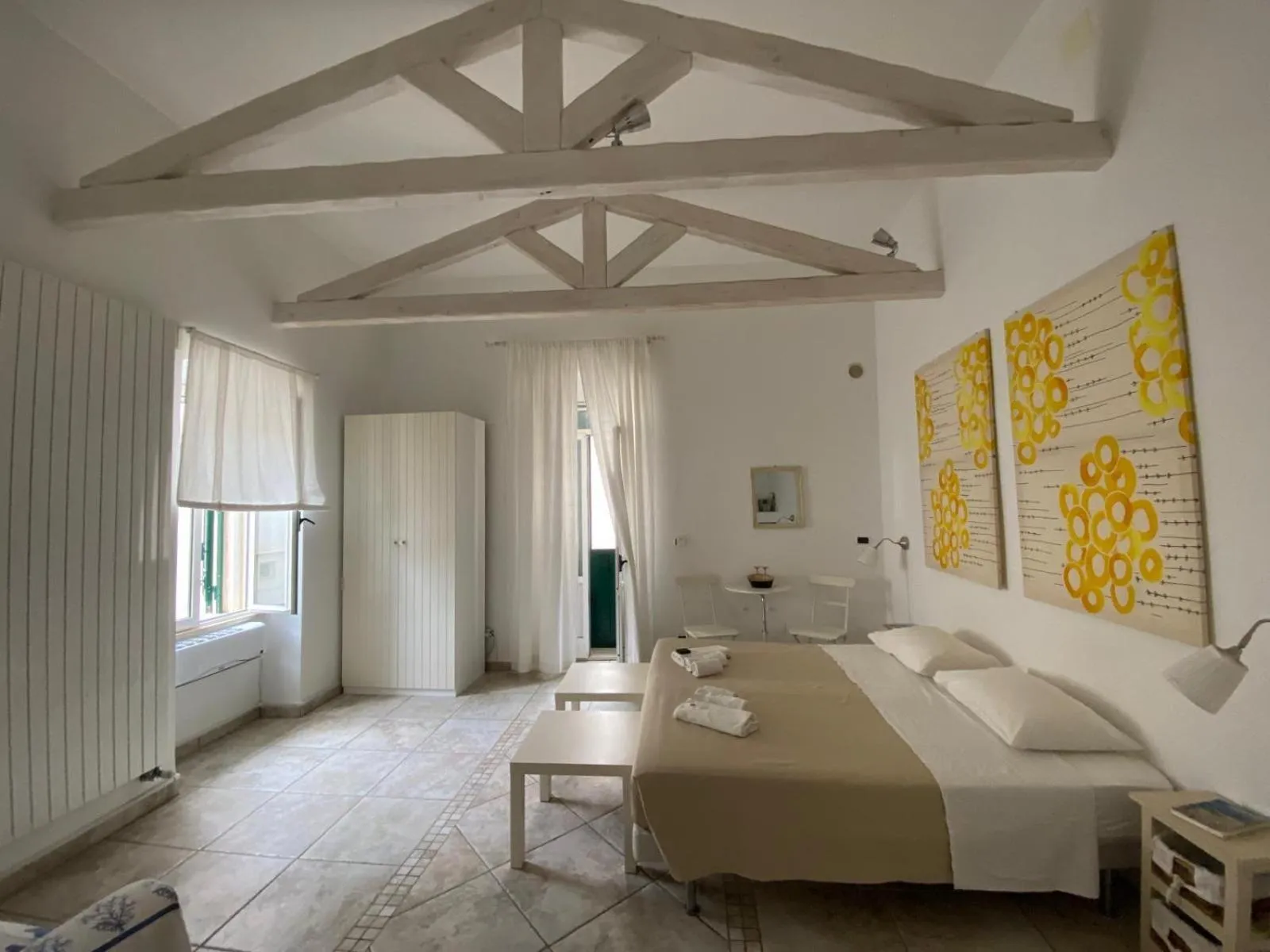 Bed in La Torre e il Mare Rooms by STHEY