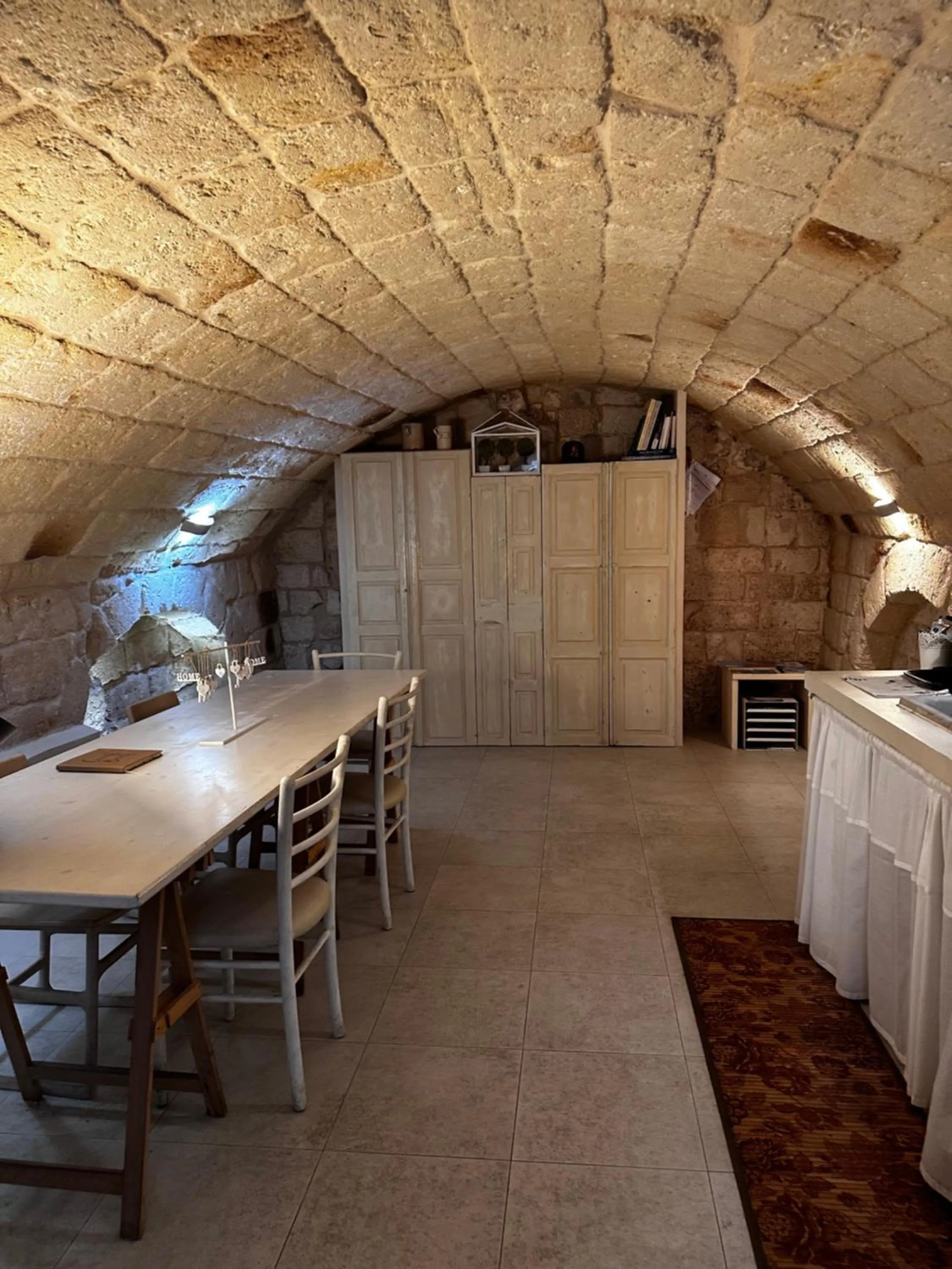 Kitchen or kitchenette in La Torre e il Mare Rooms by STHEY