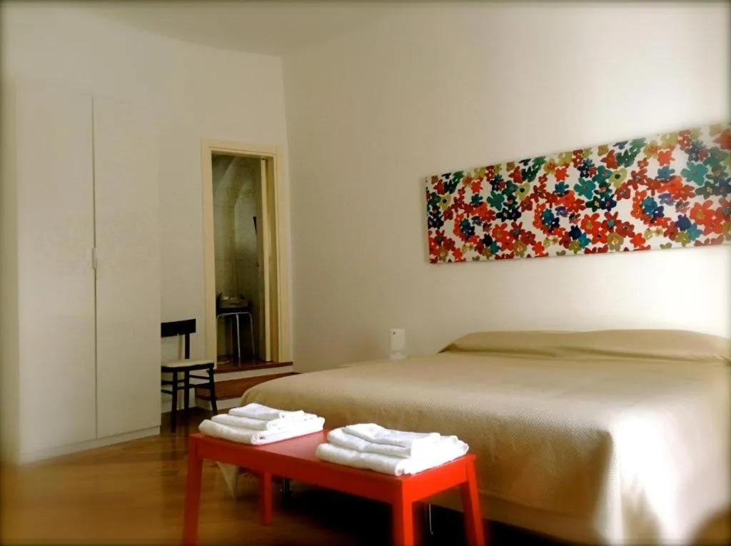 Photo of the whole room, Bed in La Torre e il Mare Rooms by STHEY