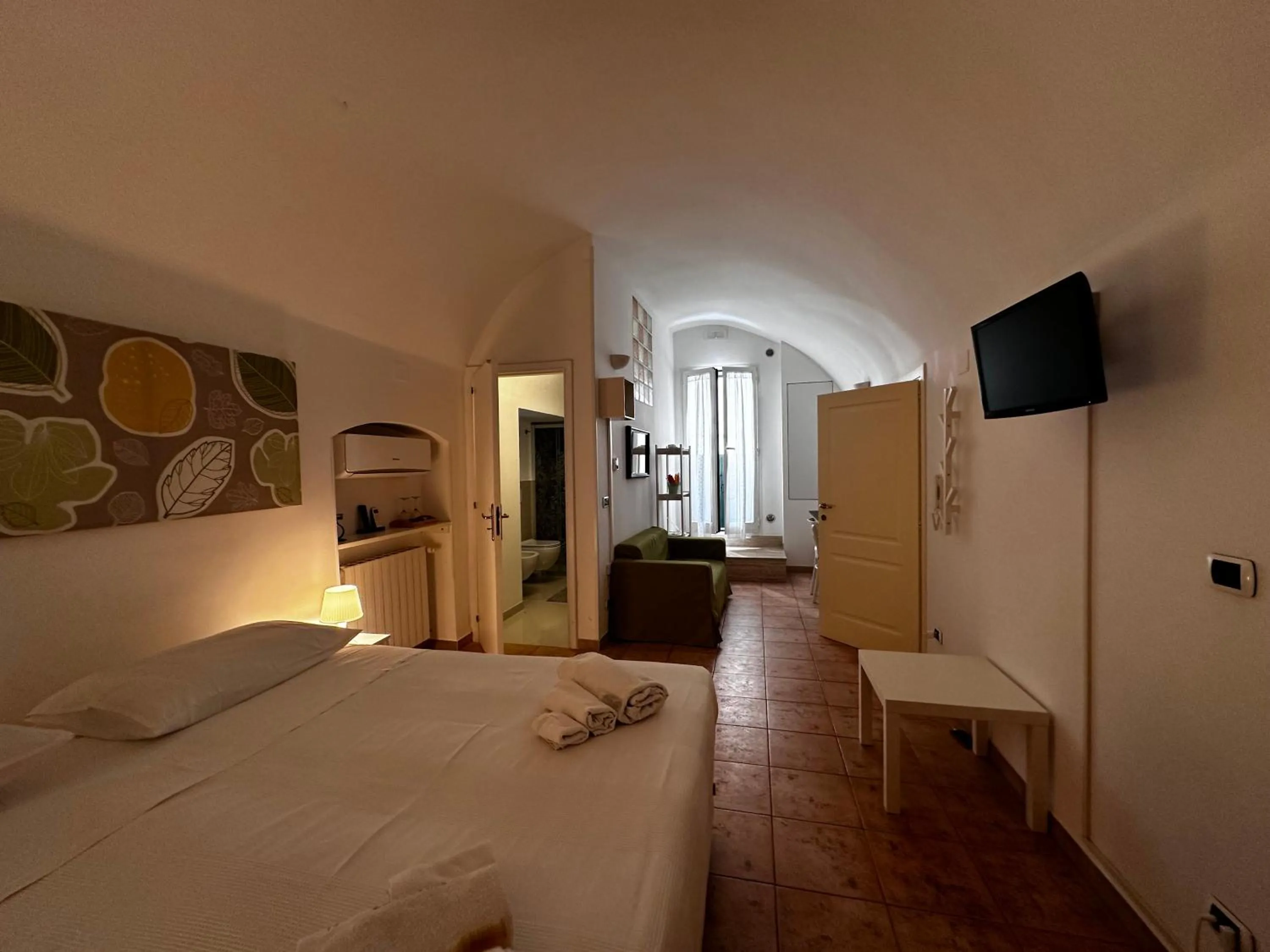 Photo of the whole room, Bed in La Torre e il Mare Rooms by STHEY