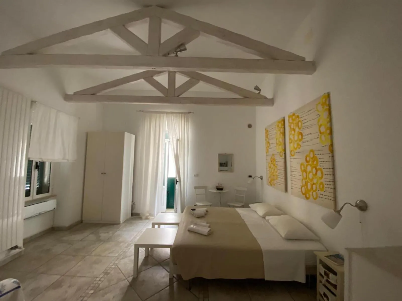 Photo of the whole room, Bed in La Torre e il Mare Rooms by STHEY