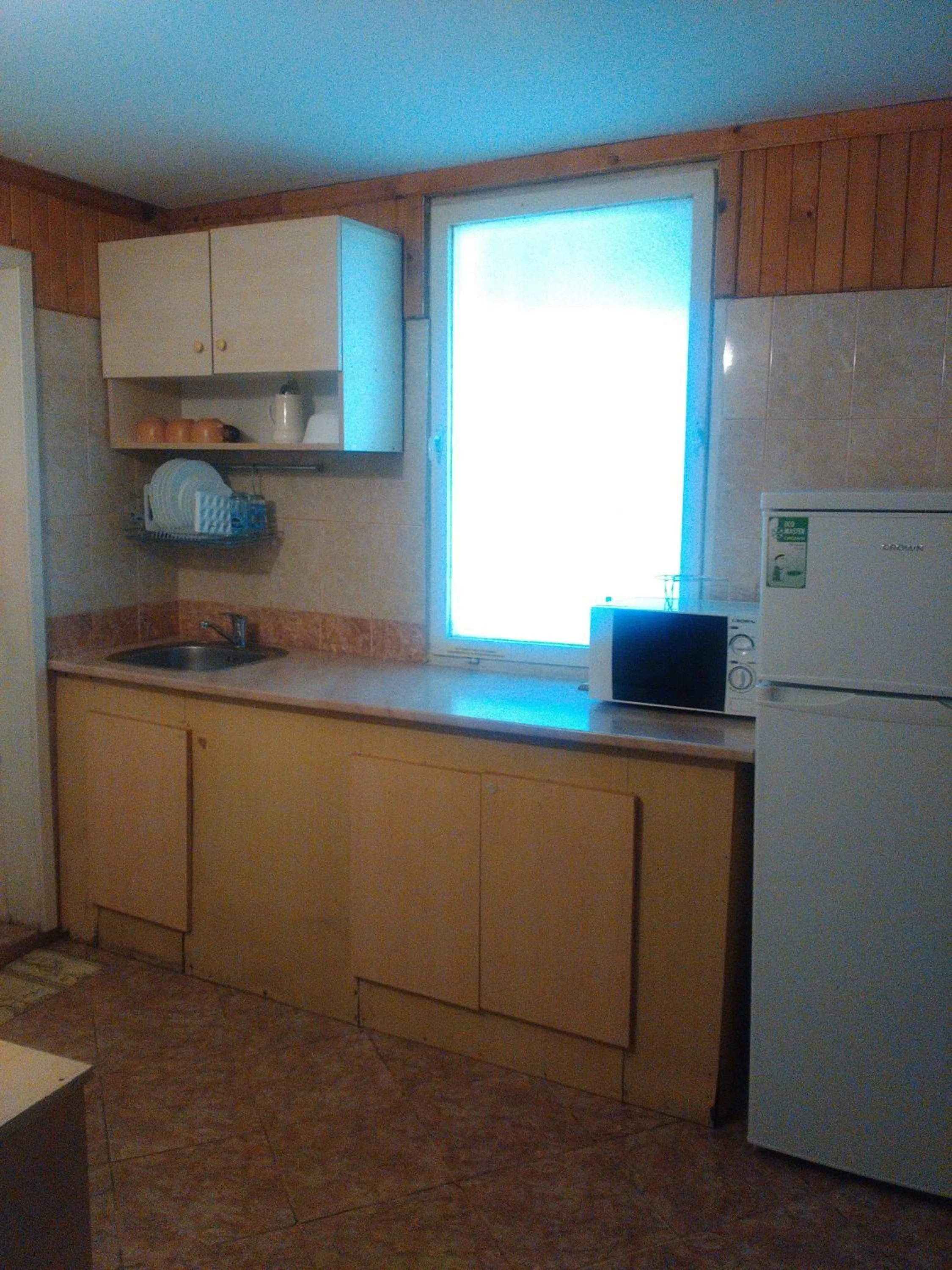 Kitchen or kitchenette in Nimpha Bungalows
