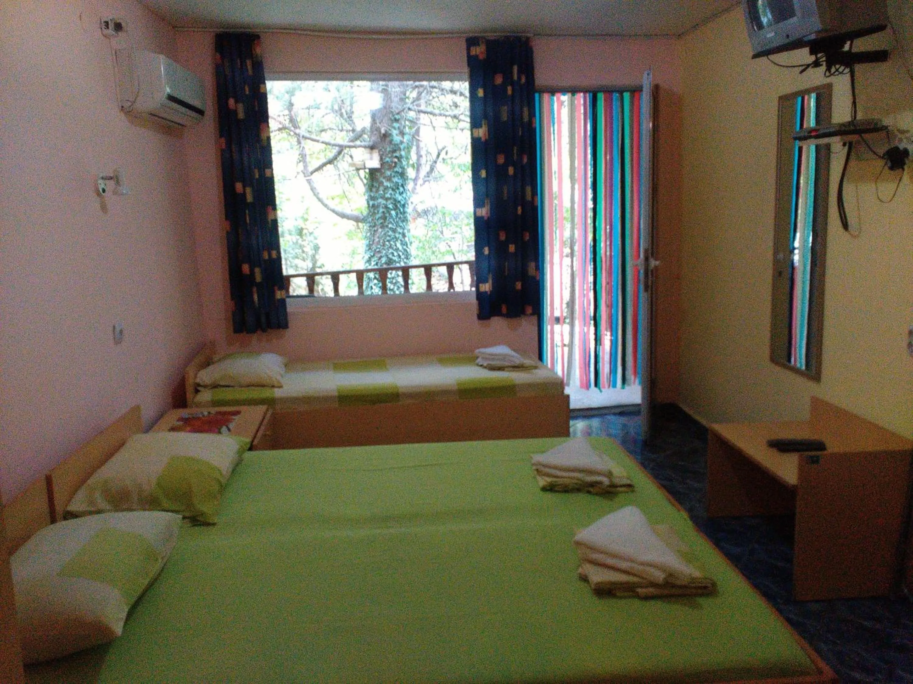 Photo of the whole room, Bed in Nimpha Bungalows