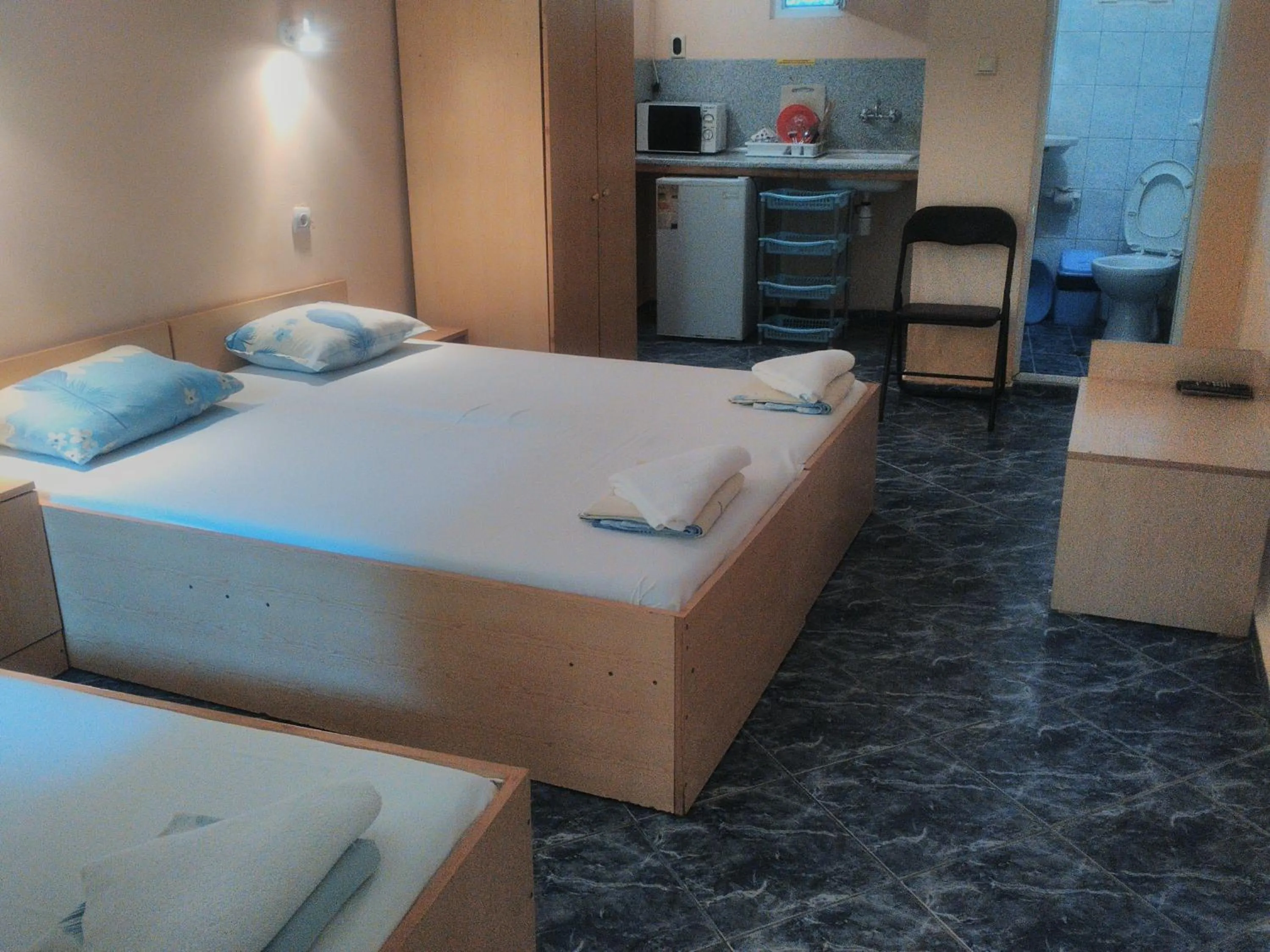 Photo of the whole room, Bed in Nimpha Bungalows