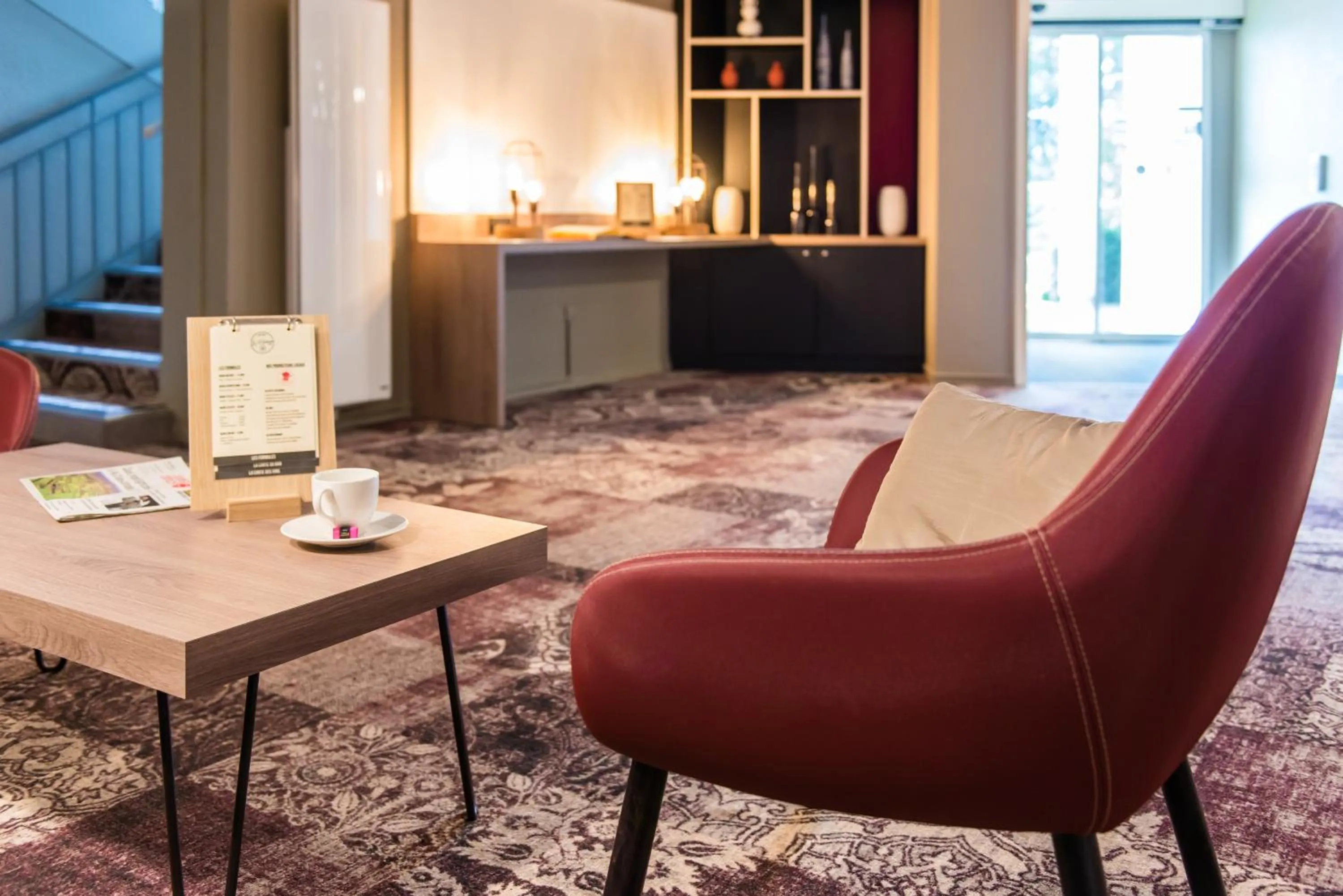 Seating area in Brit Hotel Brest Le Relecq Kerhuon