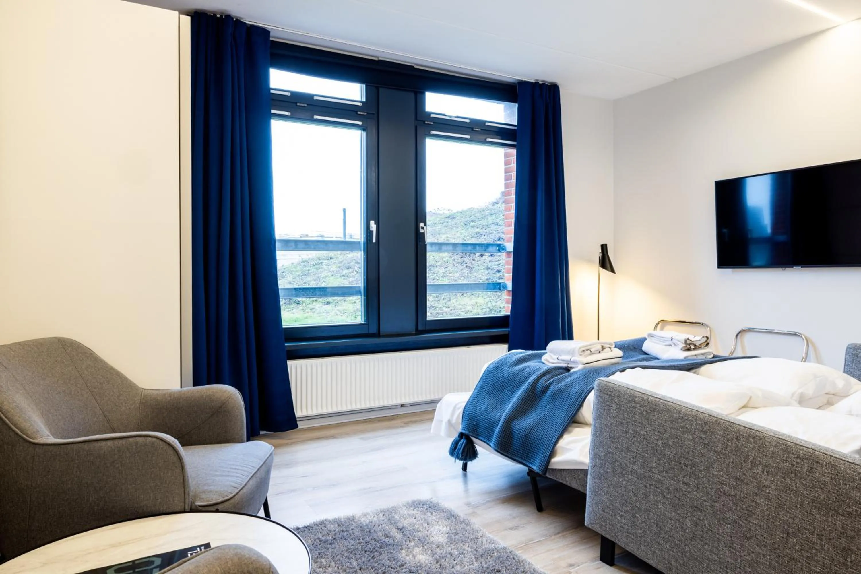 Photo of the whole room, Bed in Hotel Sønderborg Kaserne