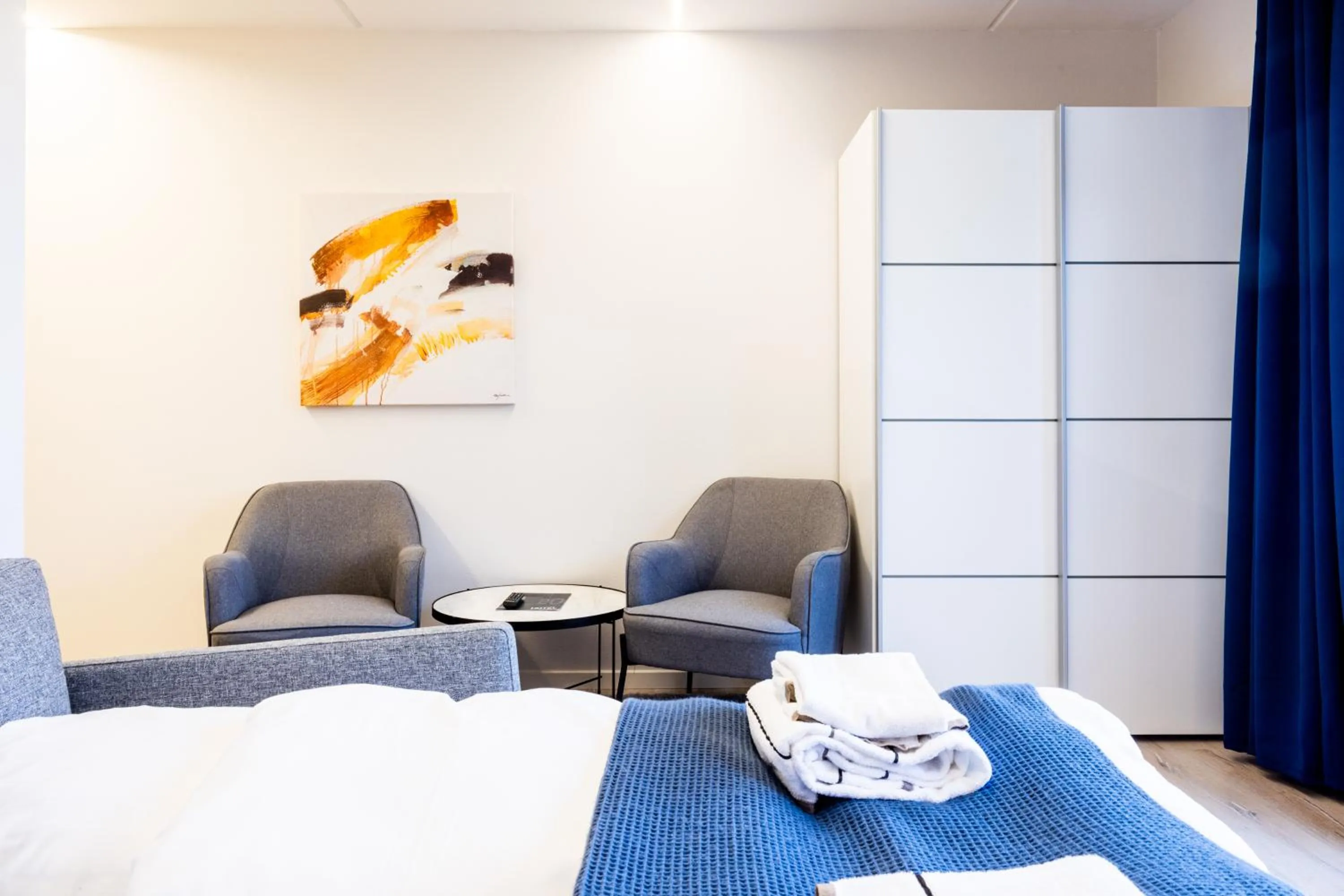 Seating area, Bed in Hotel Sønderborg Kaserne