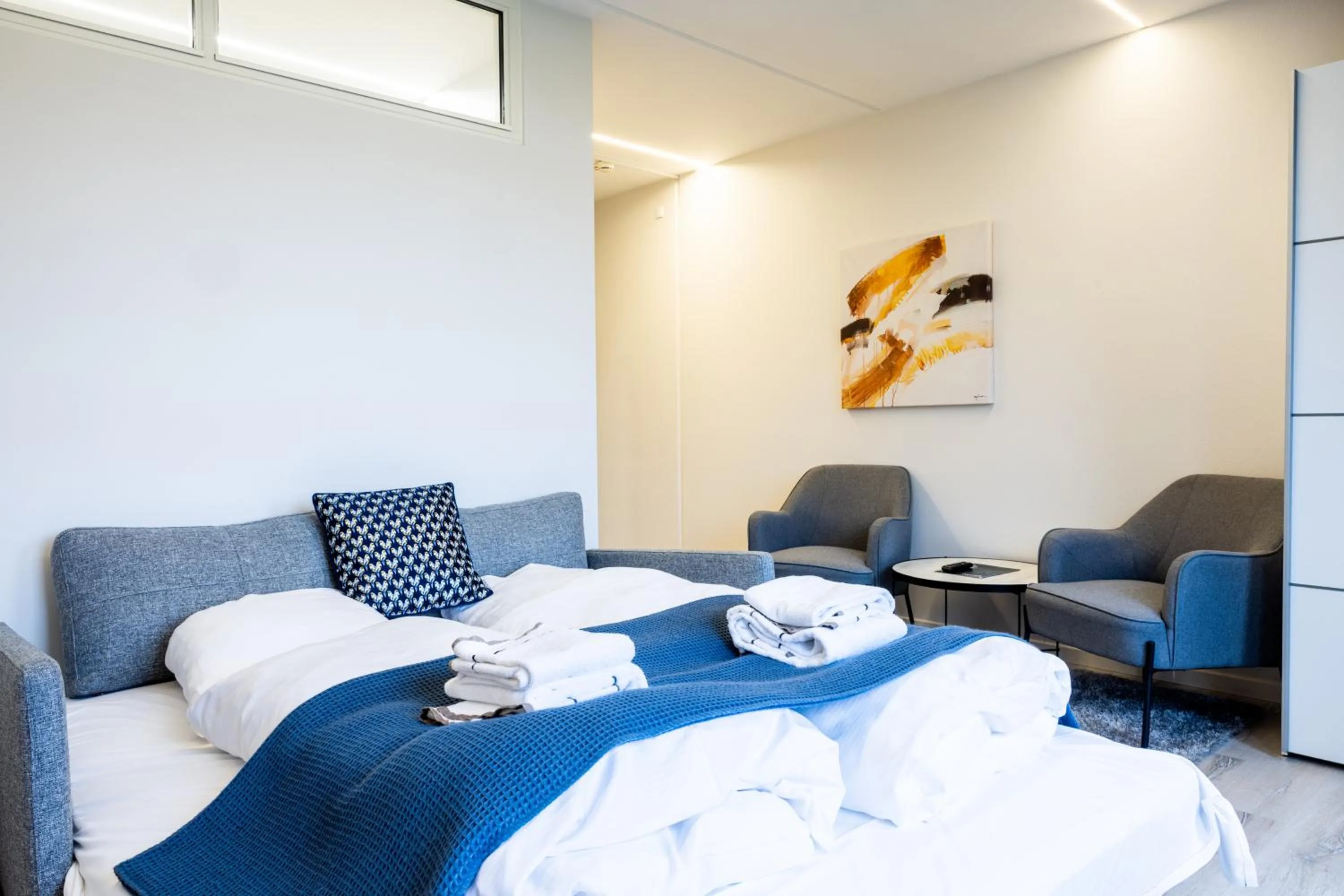 Living room, Bed in Hotel Sønderborg Kaserne