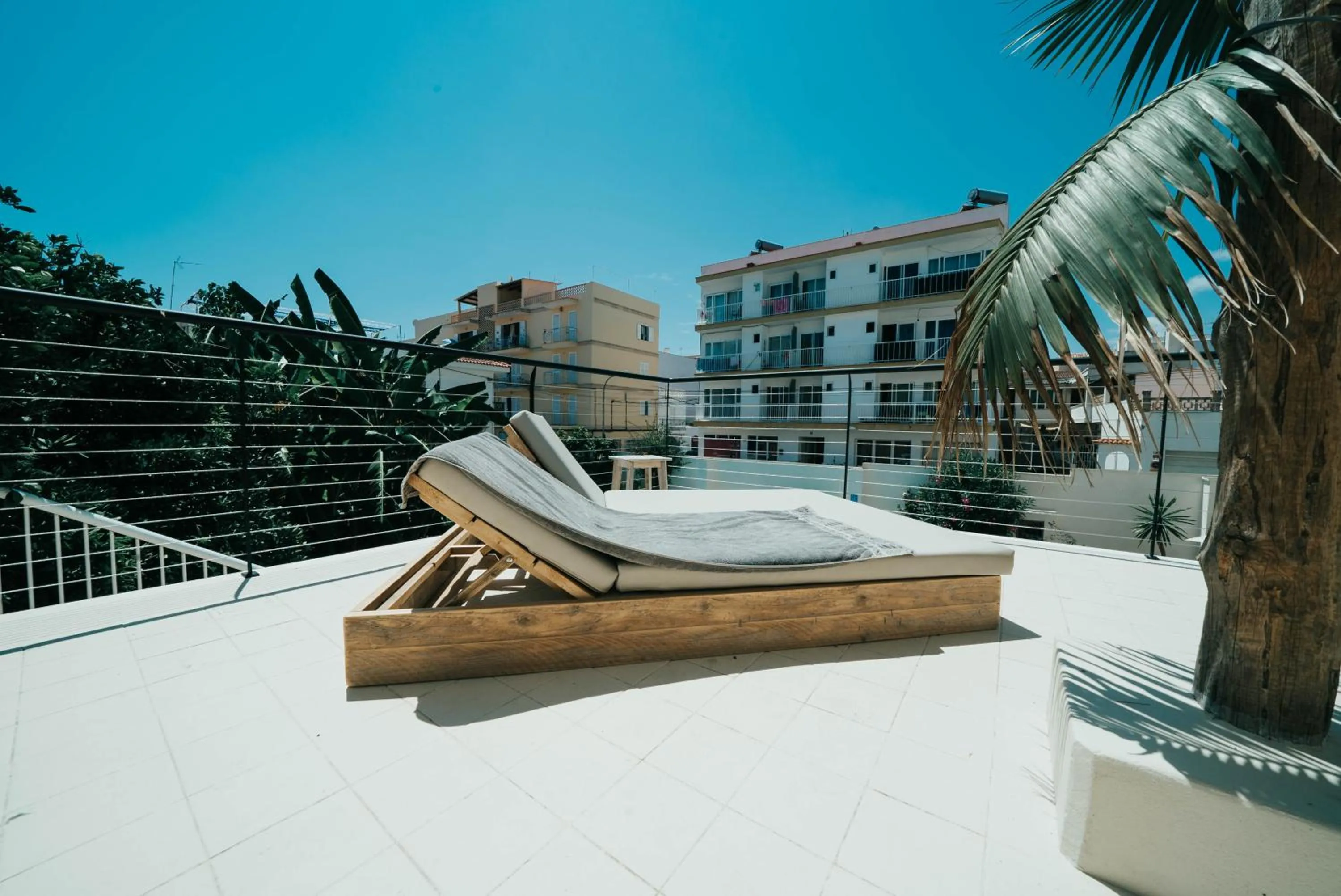 Communal lounge/ TV room in Mamboo Hotel Cala Ratjada