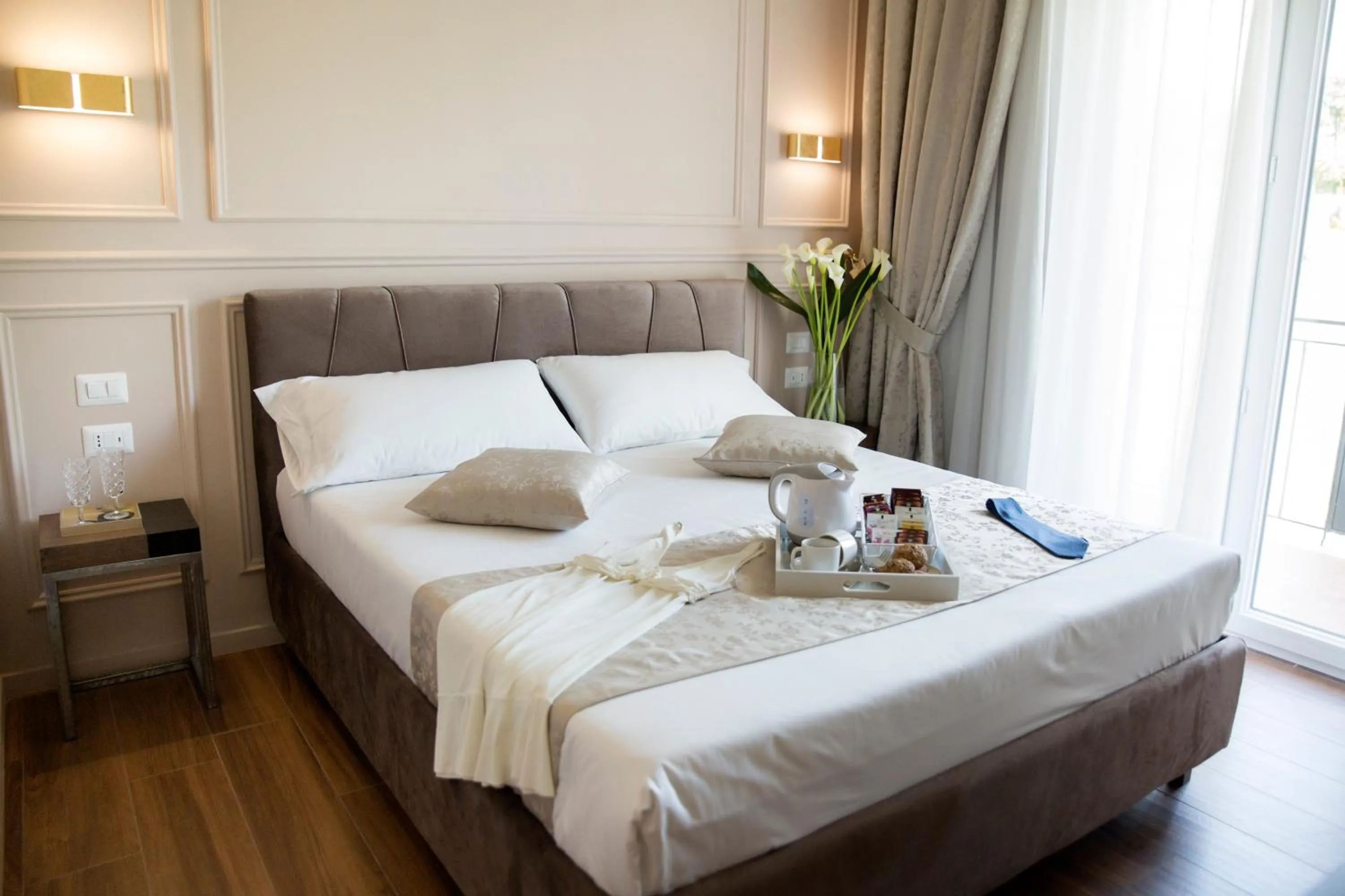 Bed in Unicum Roma Suites