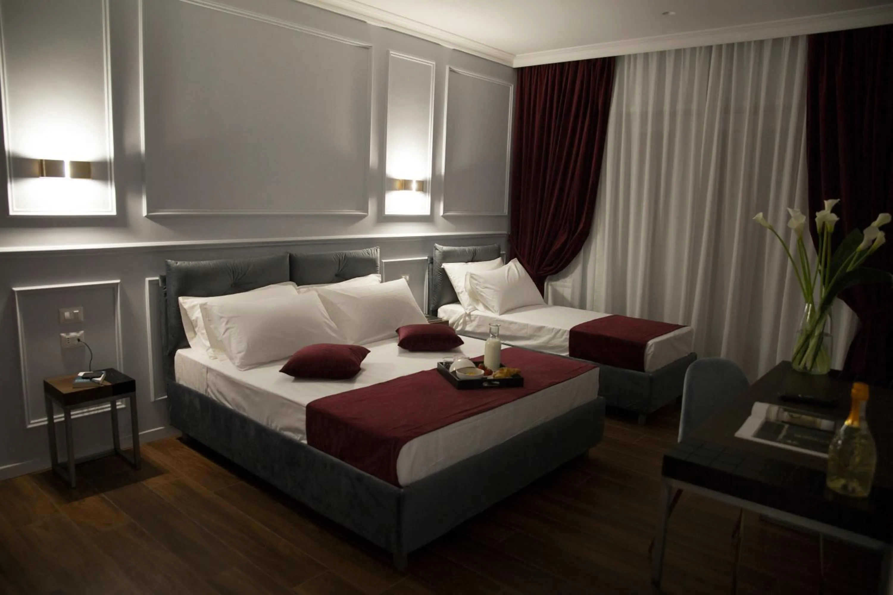 Bed in Unicum Roma Suites