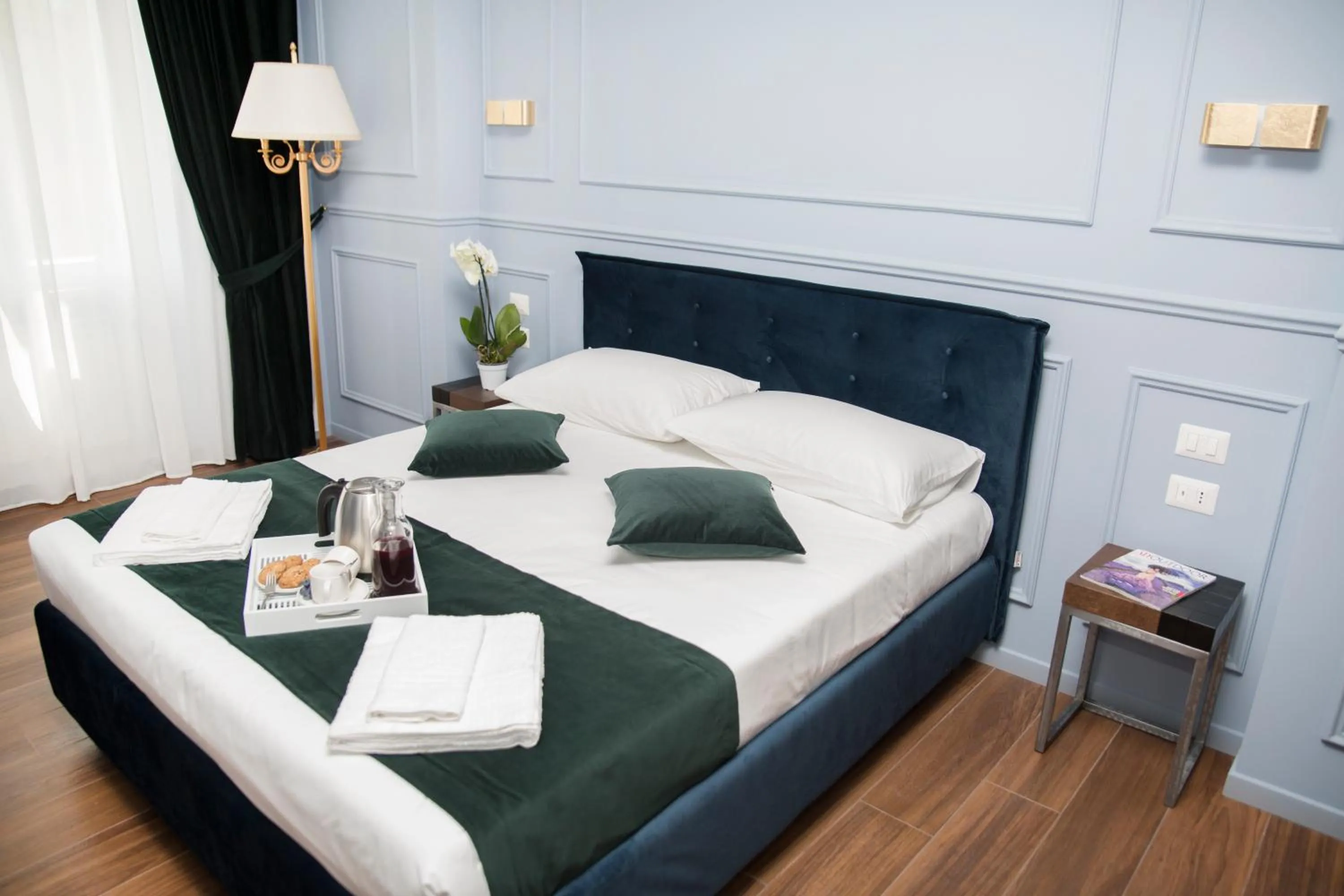 Bed in Unicum Roma Suites