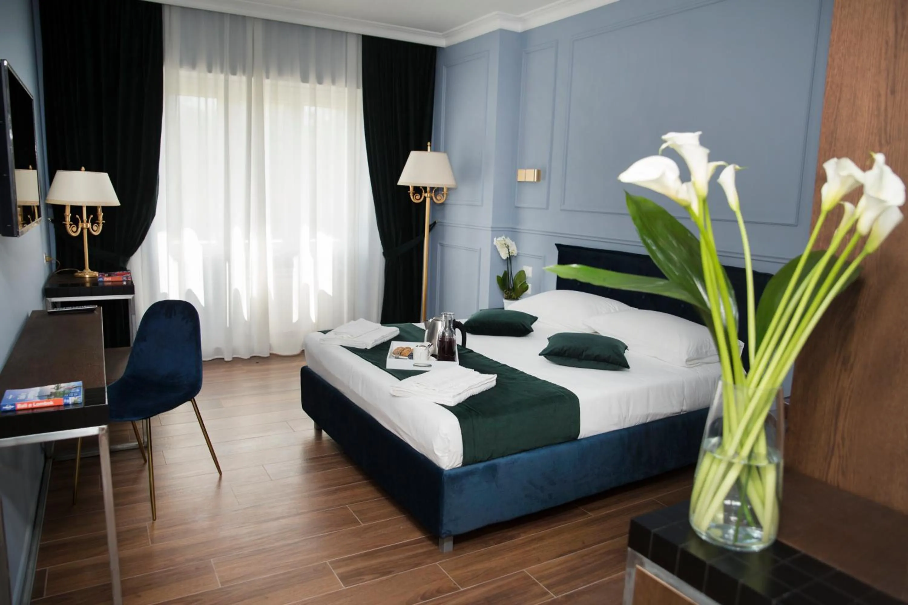 Bed in Unicum Roma Suites