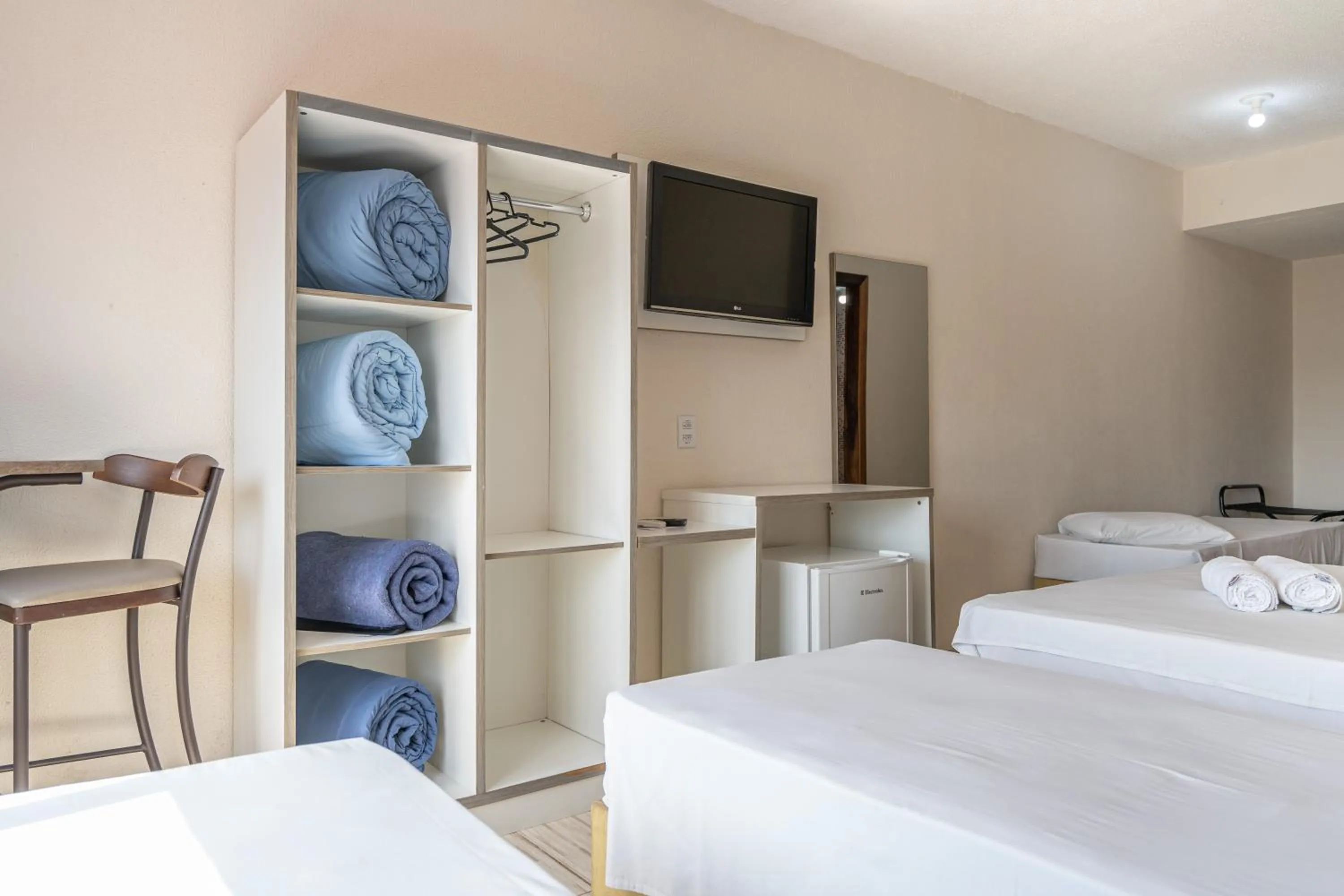 Bed in Hotel Conexão