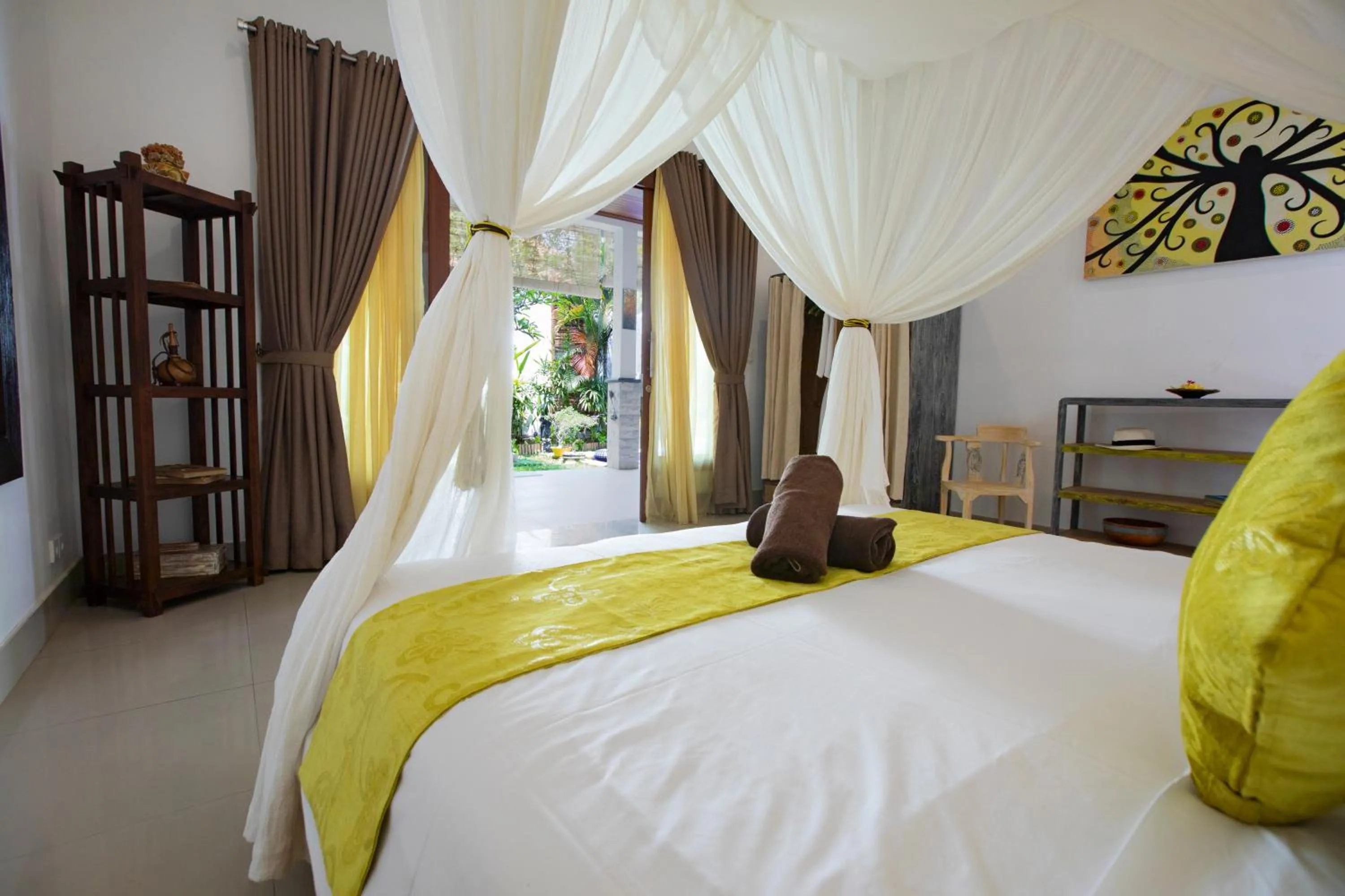 Bed in MasBro ART Villas