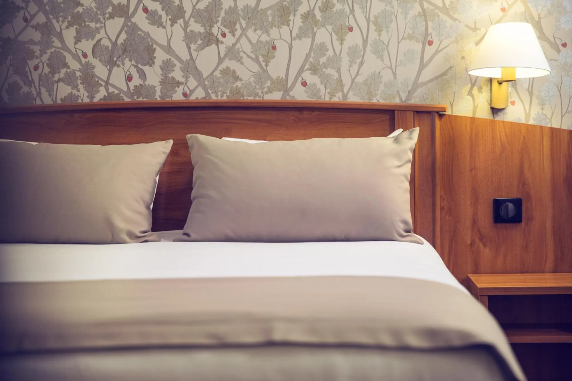 Bed in Timhotel Le Louvre