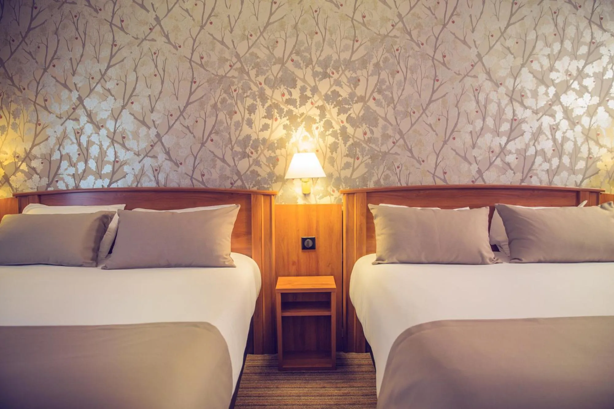 Bed in Timhotel Le Louvre