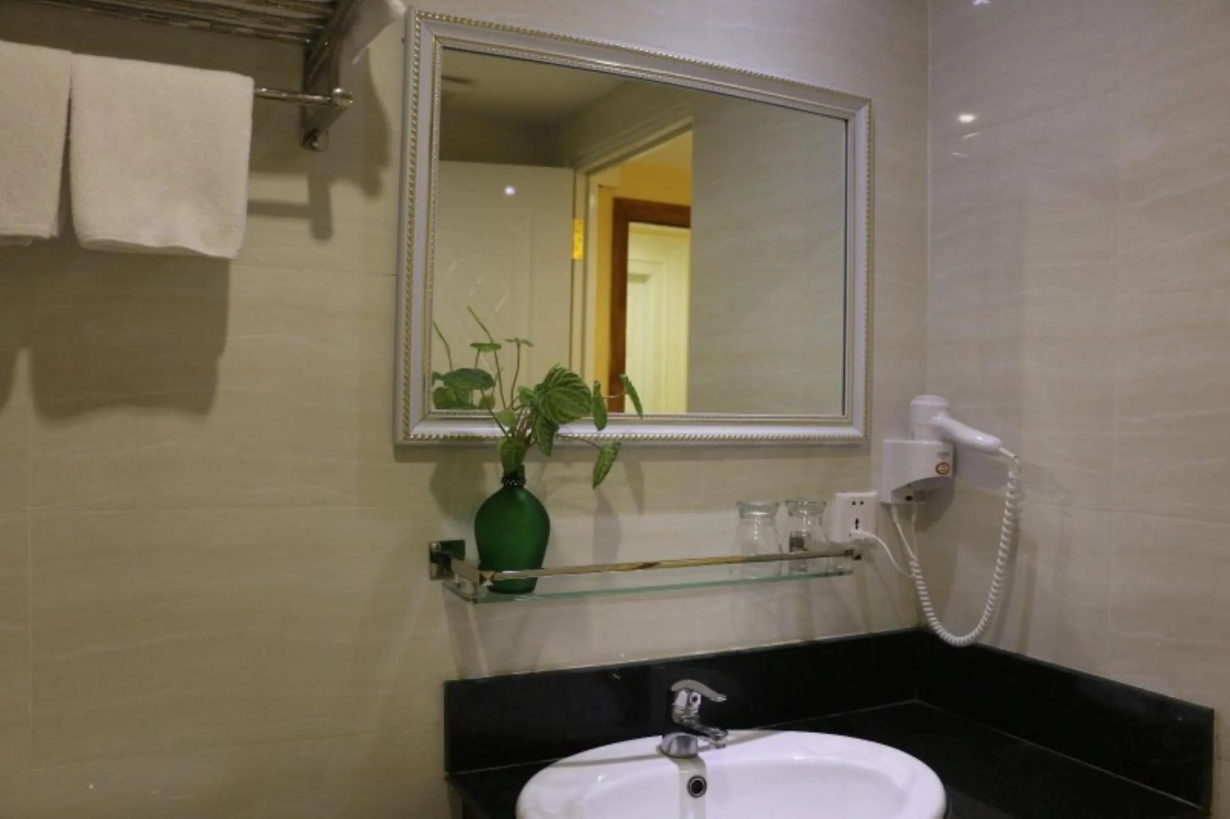 Bathroom in You Eng Hotel