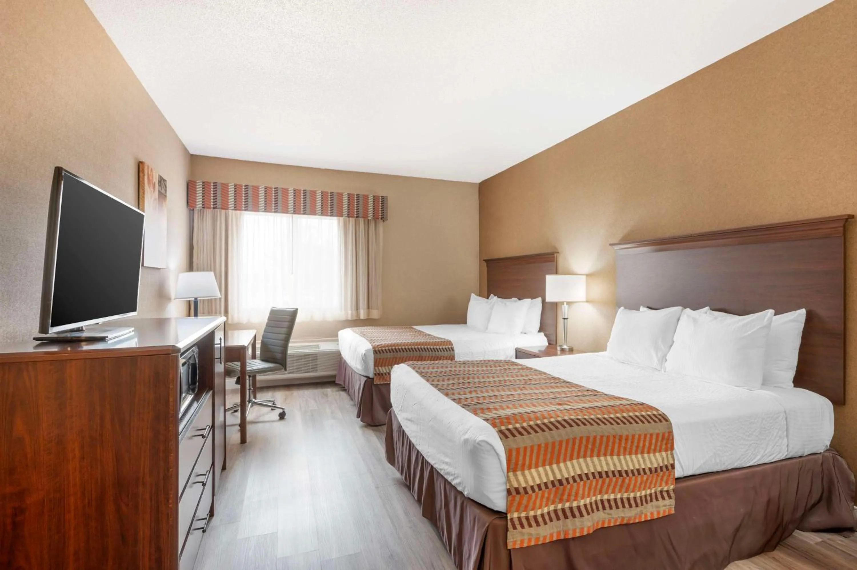 Bedroom, Bed in Best Western Circus City Inn