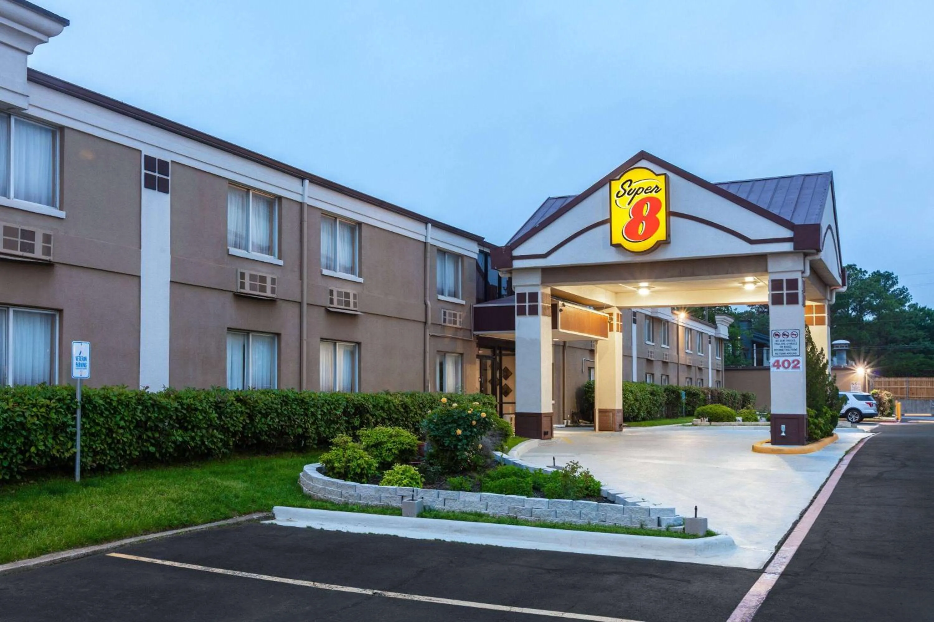 Property building in Super 8 by Wyndham Grand Prairie North