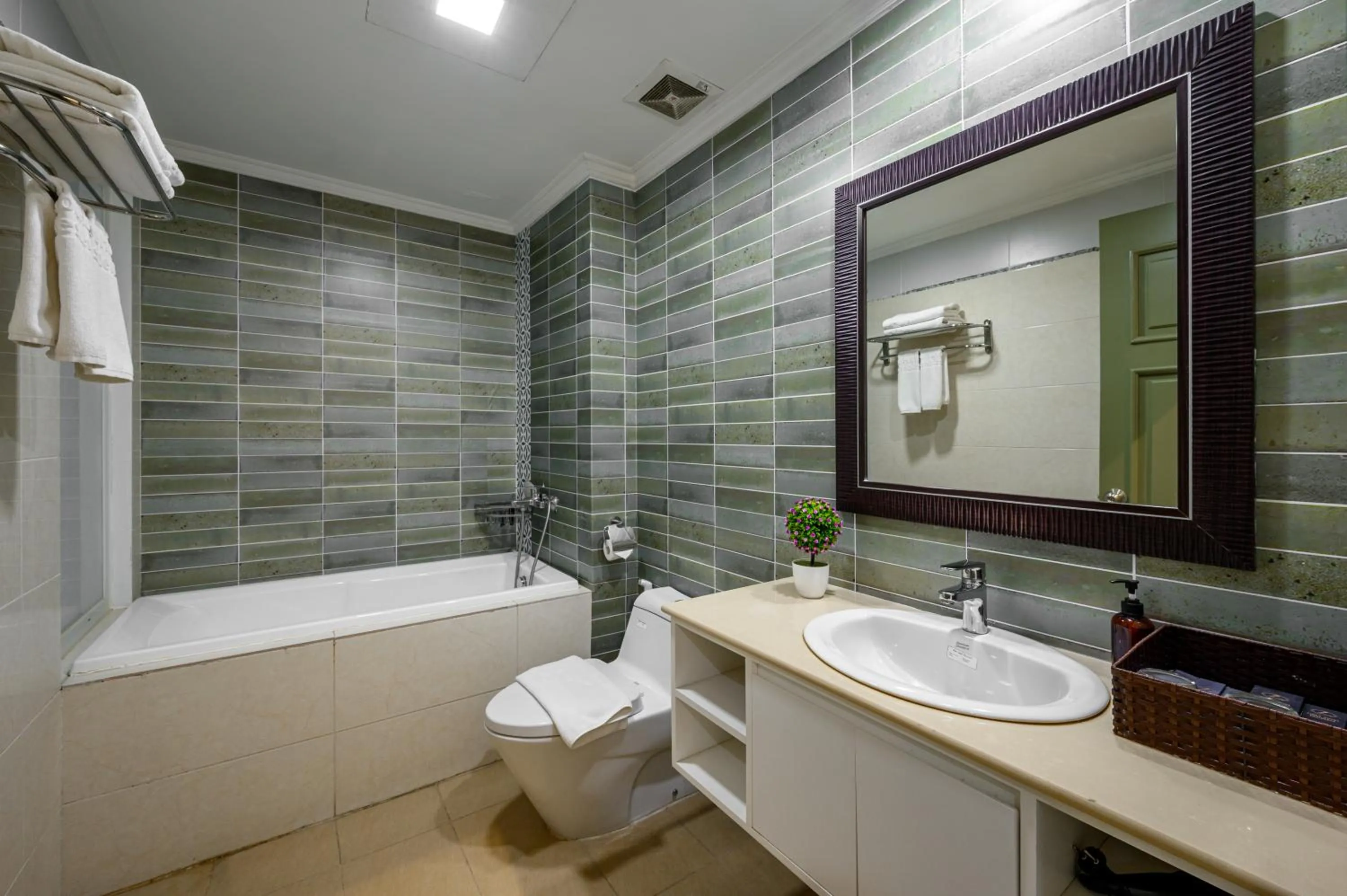 Toilet in Libra Hotel Residence by Luxe Paradise