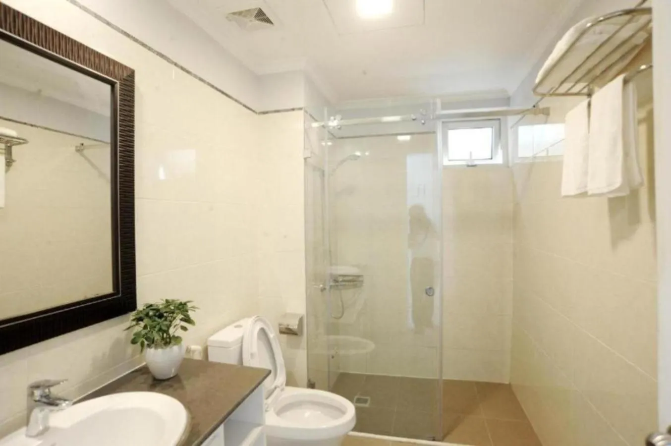 Toilet in Libra Hotel Residence by Luxe Paradise