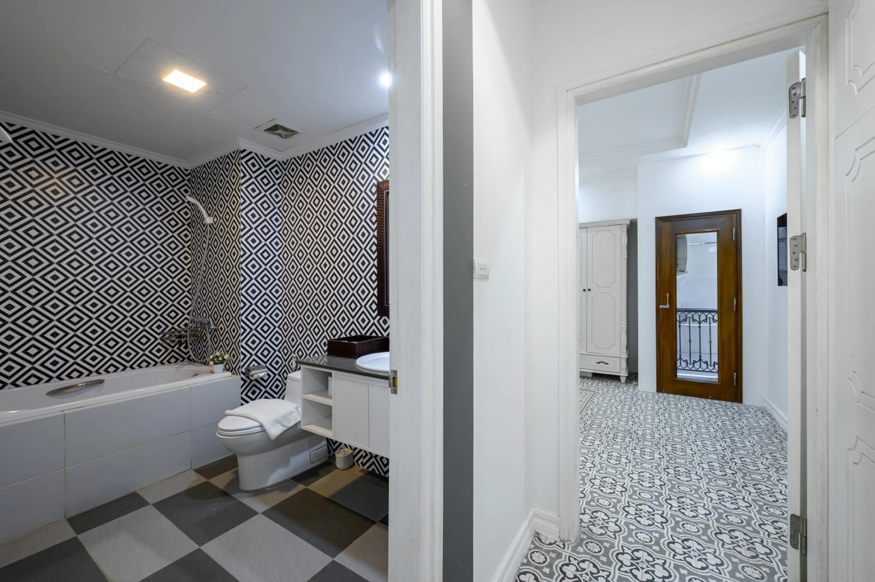 Toilet in Libra Hotel Residence by Luxe Paradise
