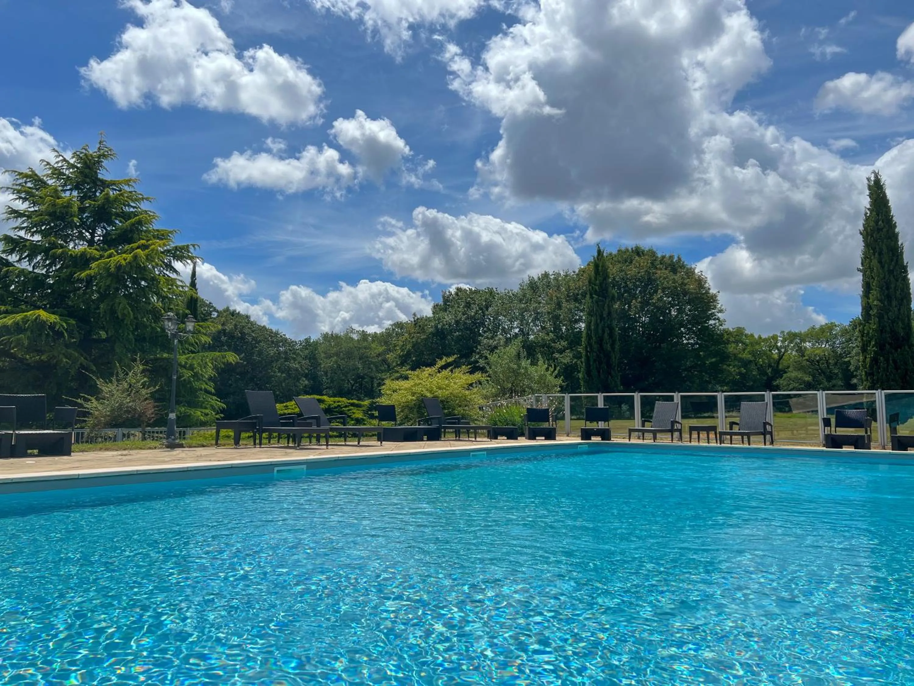 Swimming pool in Best Western Le Bois de la Marche