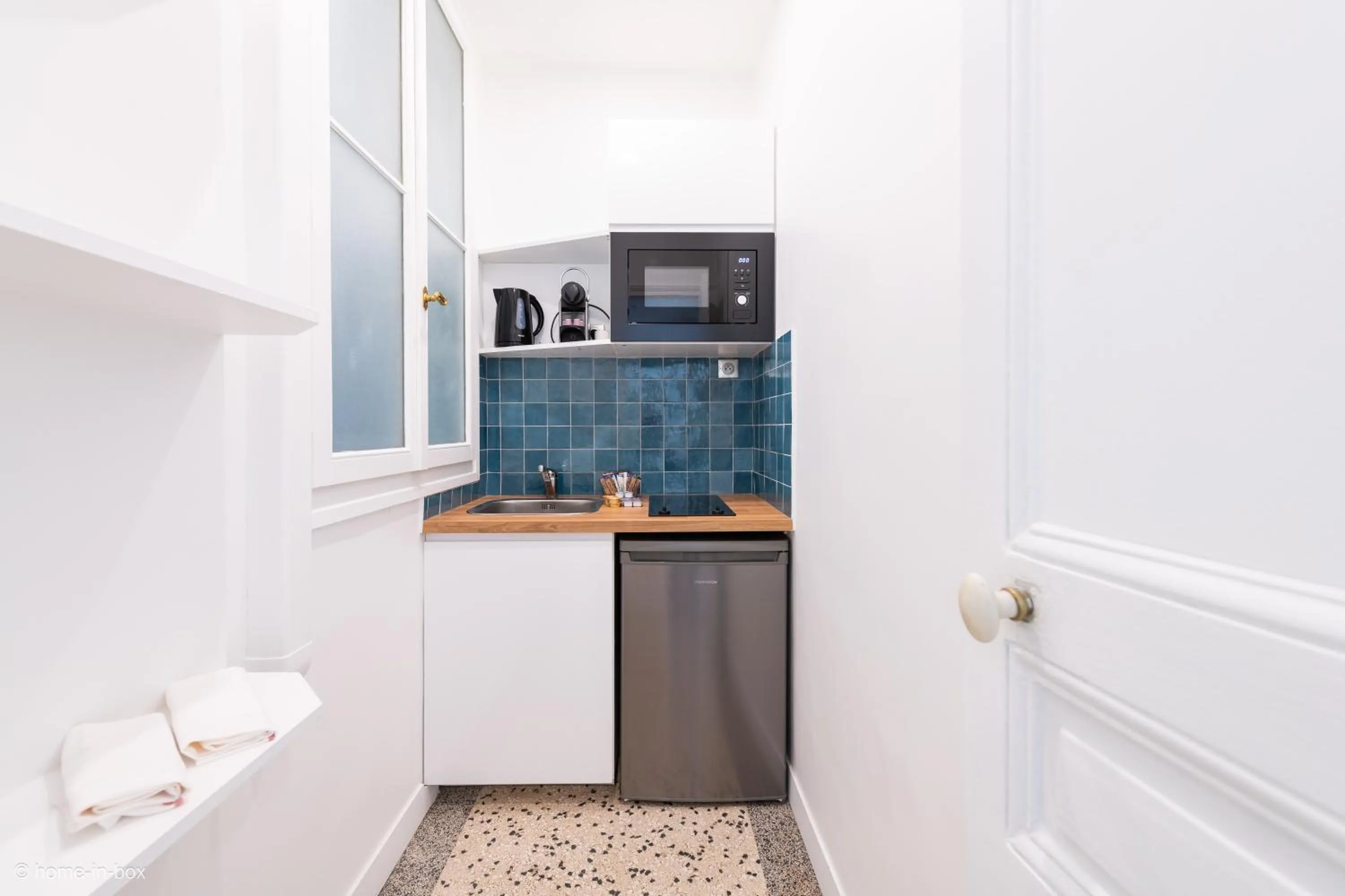 kitchen in HotelHome Paris 16