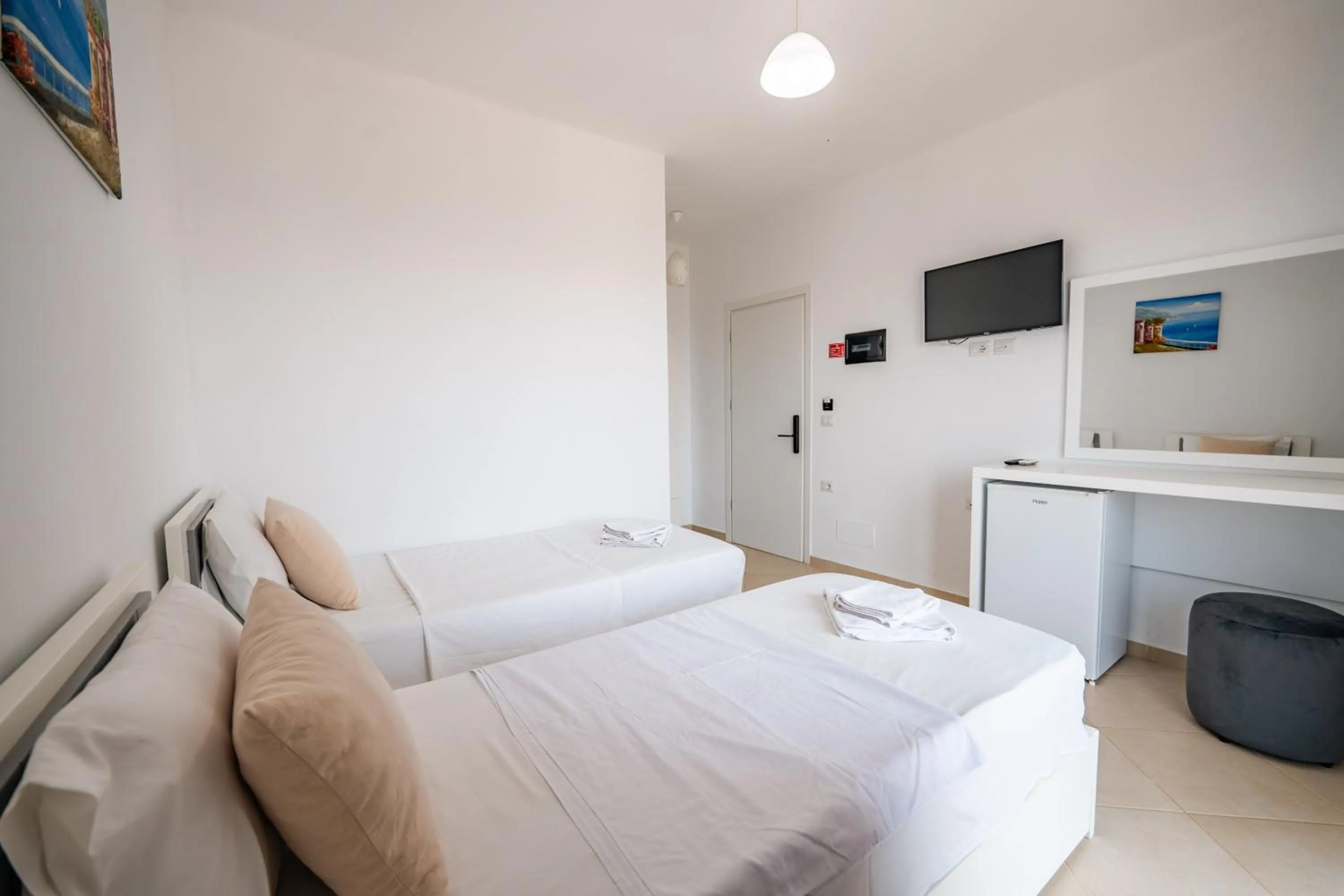 Bed in Sunshine Hotel