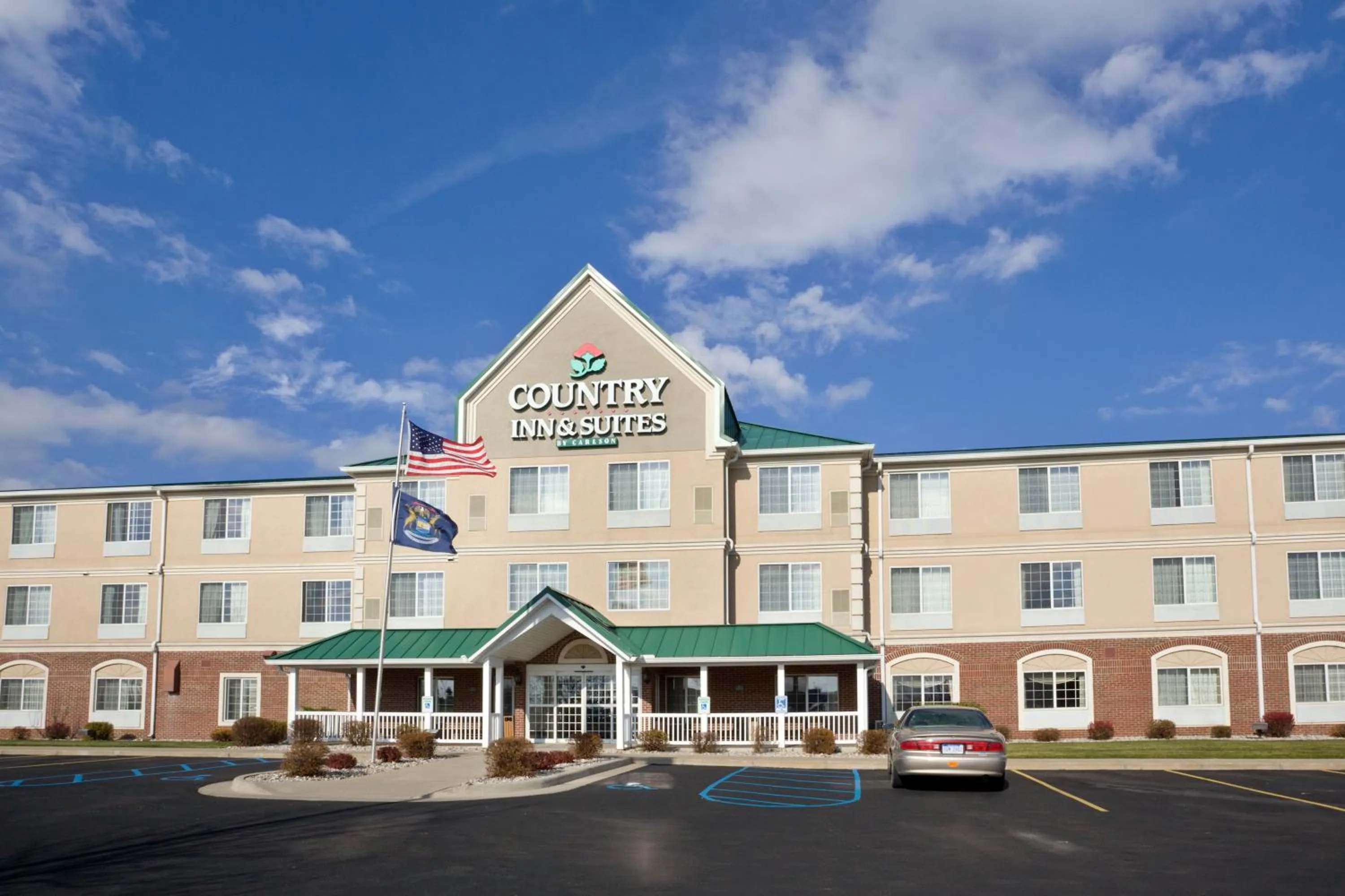 Property building in Country Inn & Suites by Radisson, Big Rapids, MI