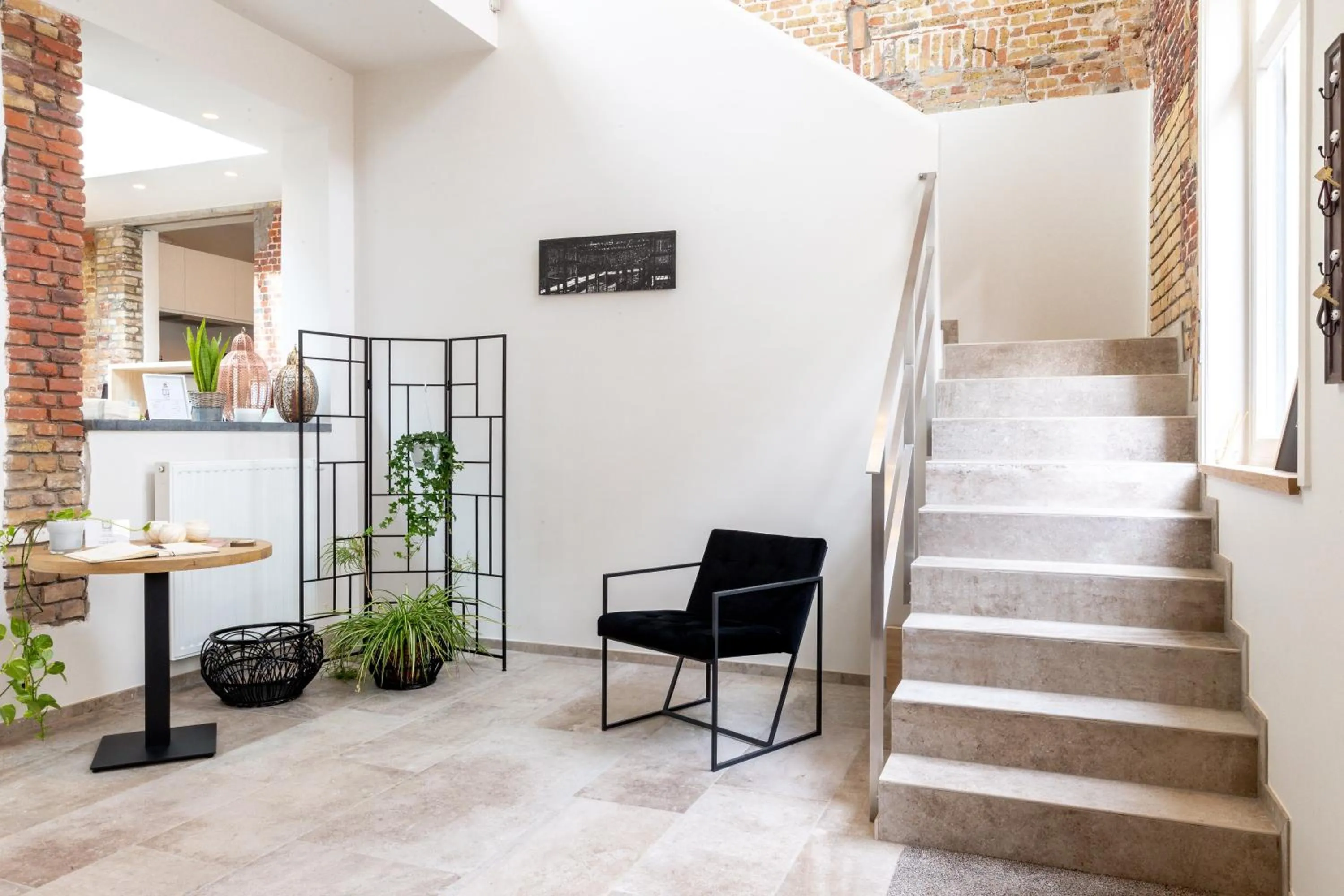 Communal lounge/ TV room in La Clé Brugge