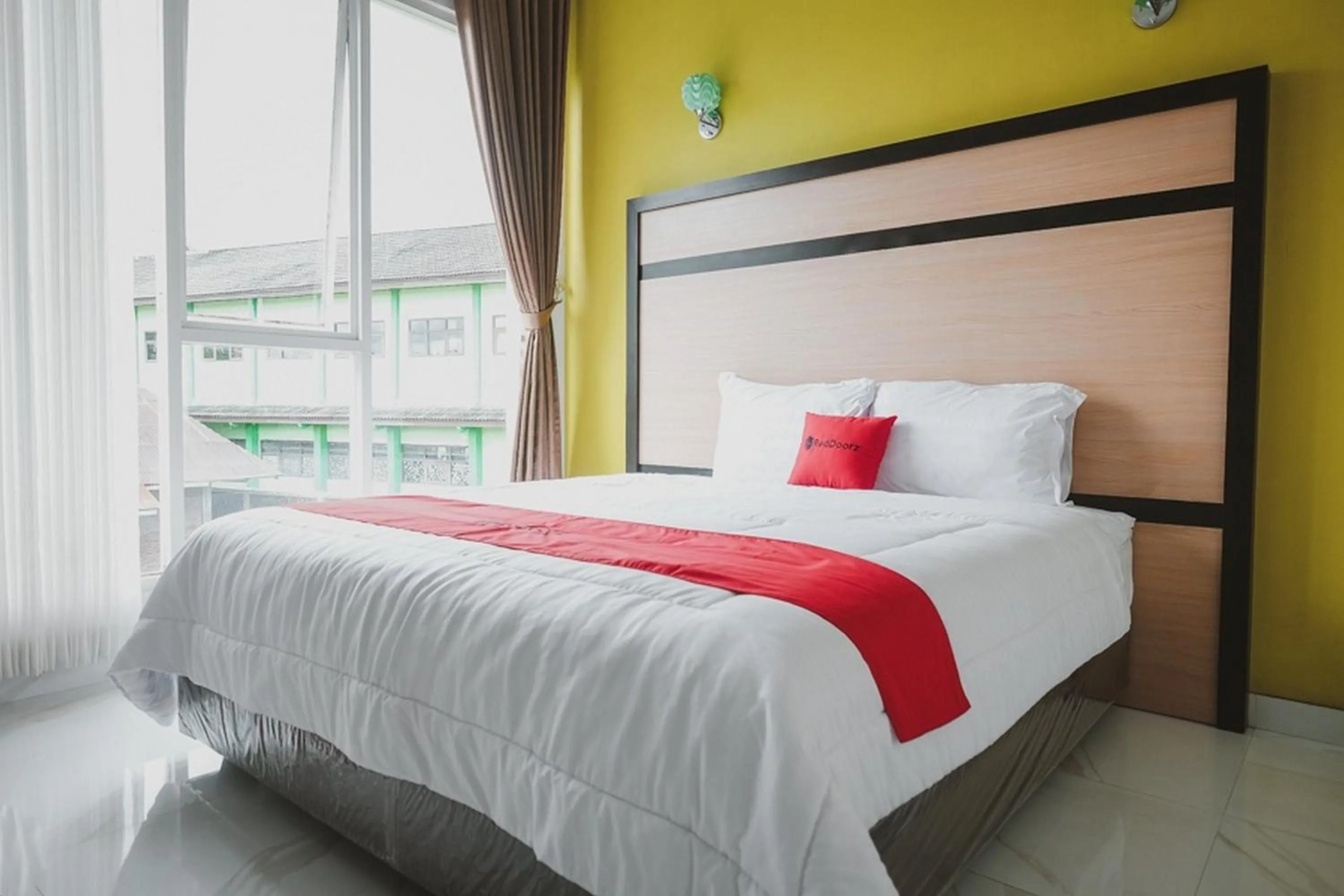 Bed in RedDoorz Syariah @ Jalan Dieng