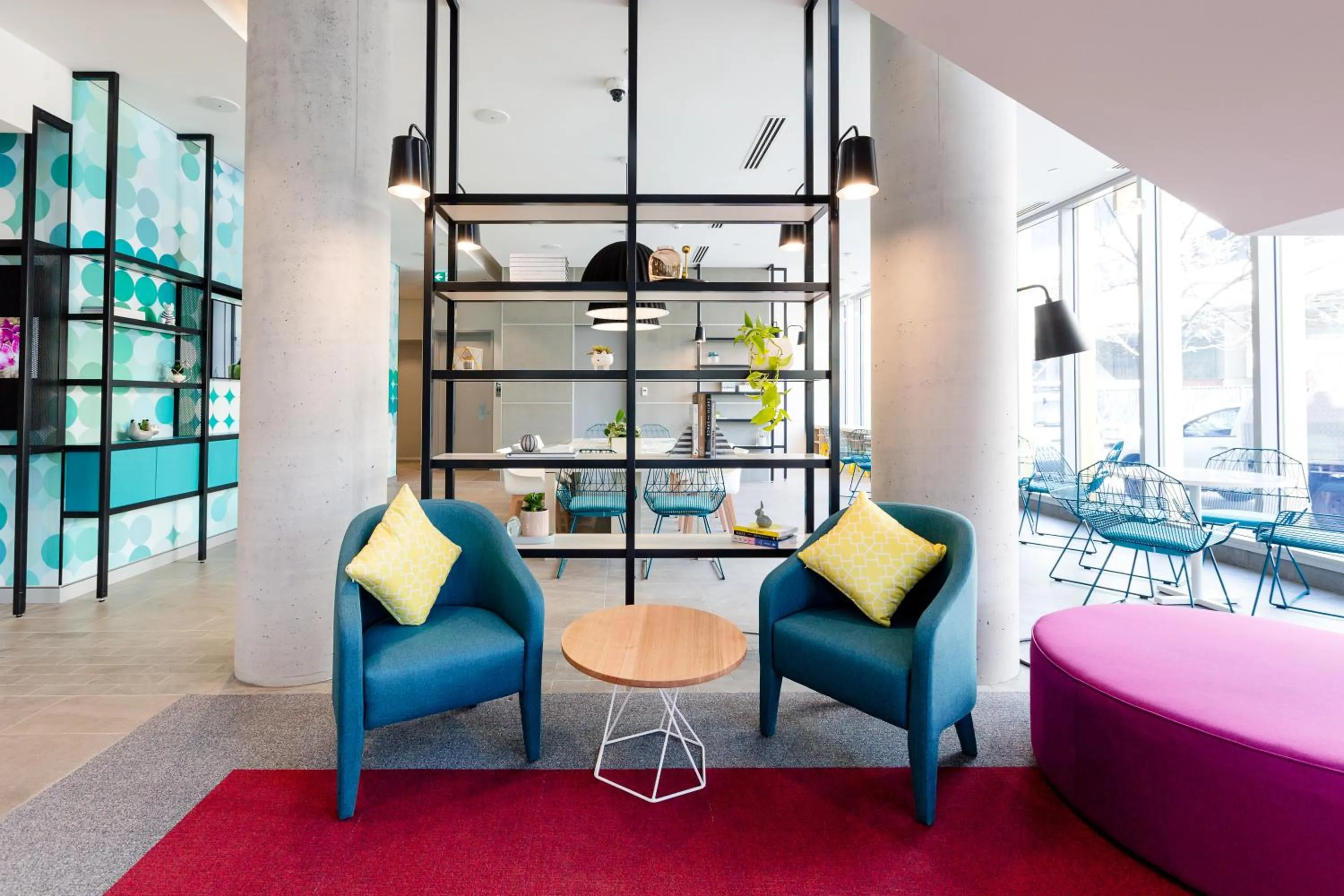 Seating area in ibis Styles East Perth